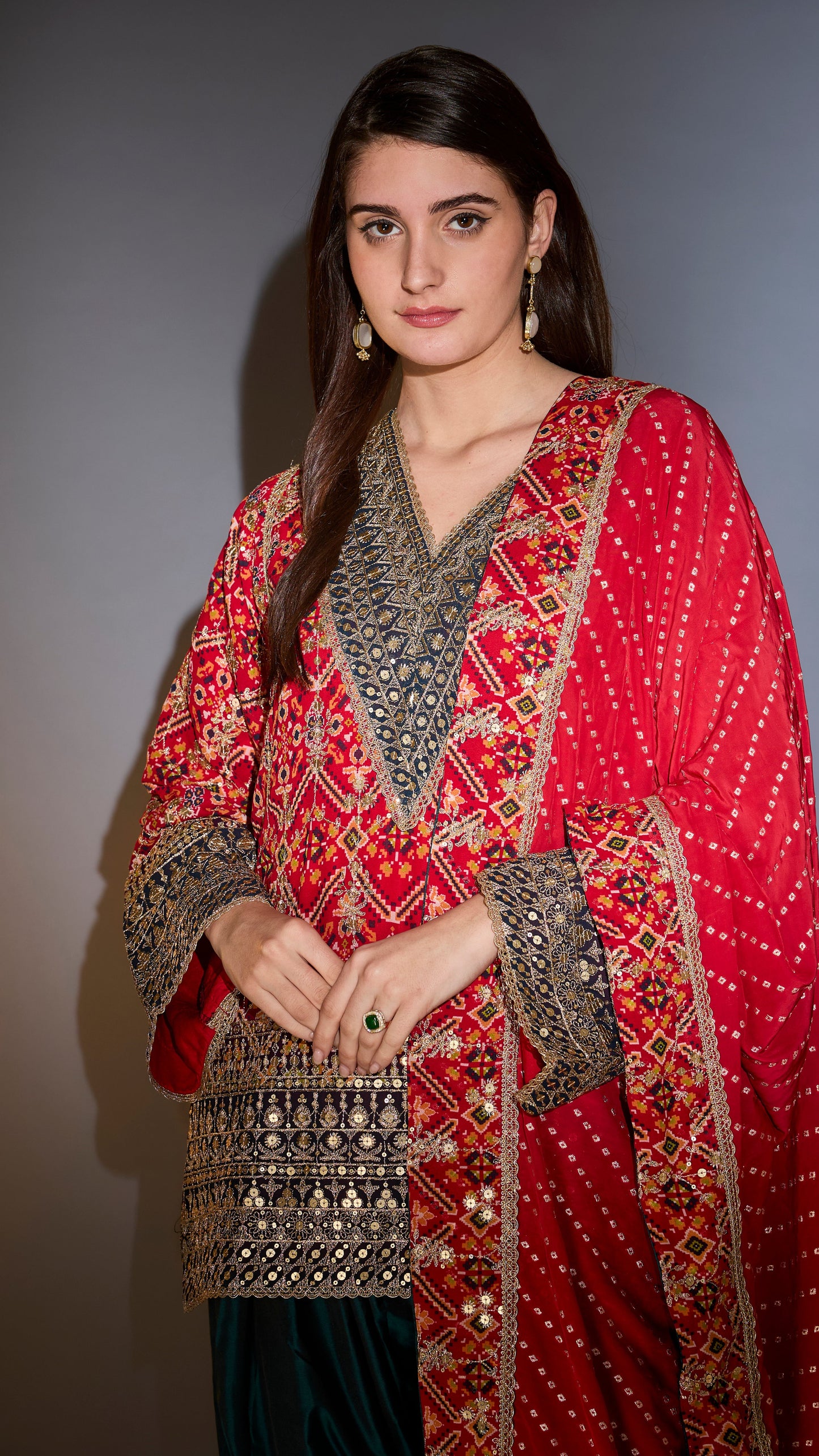 suit set with short bandhni kurta with intricate aari work paired with banarsi dupatta with borders and silk salwar