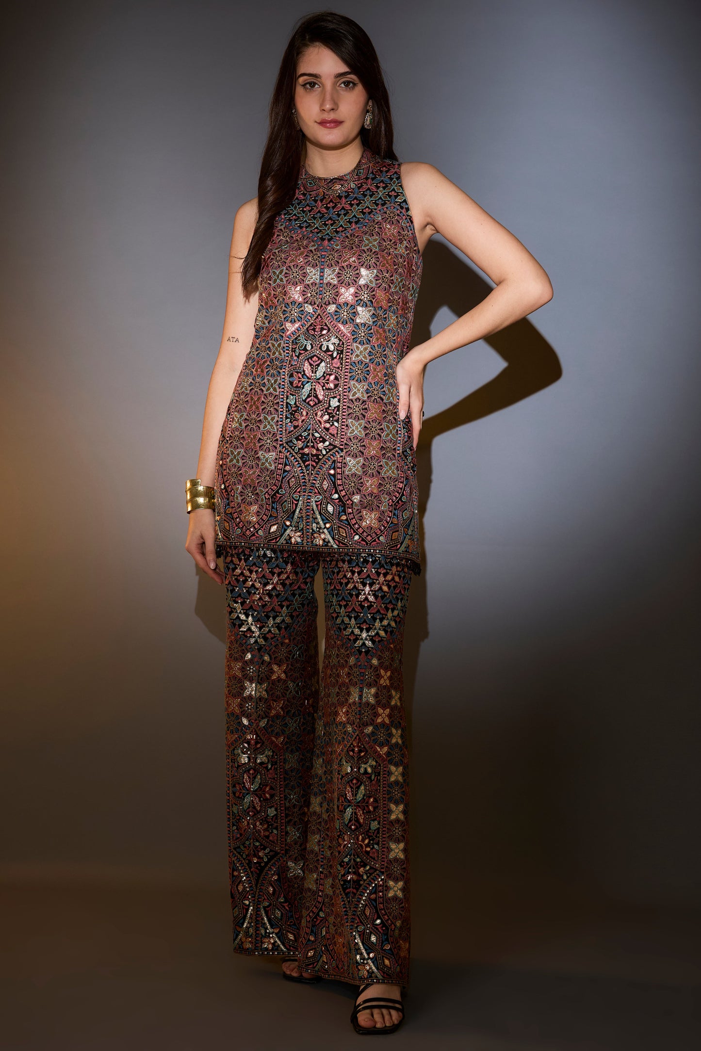 mutli coloured leather patch work co ord set paired with boot cut trousers