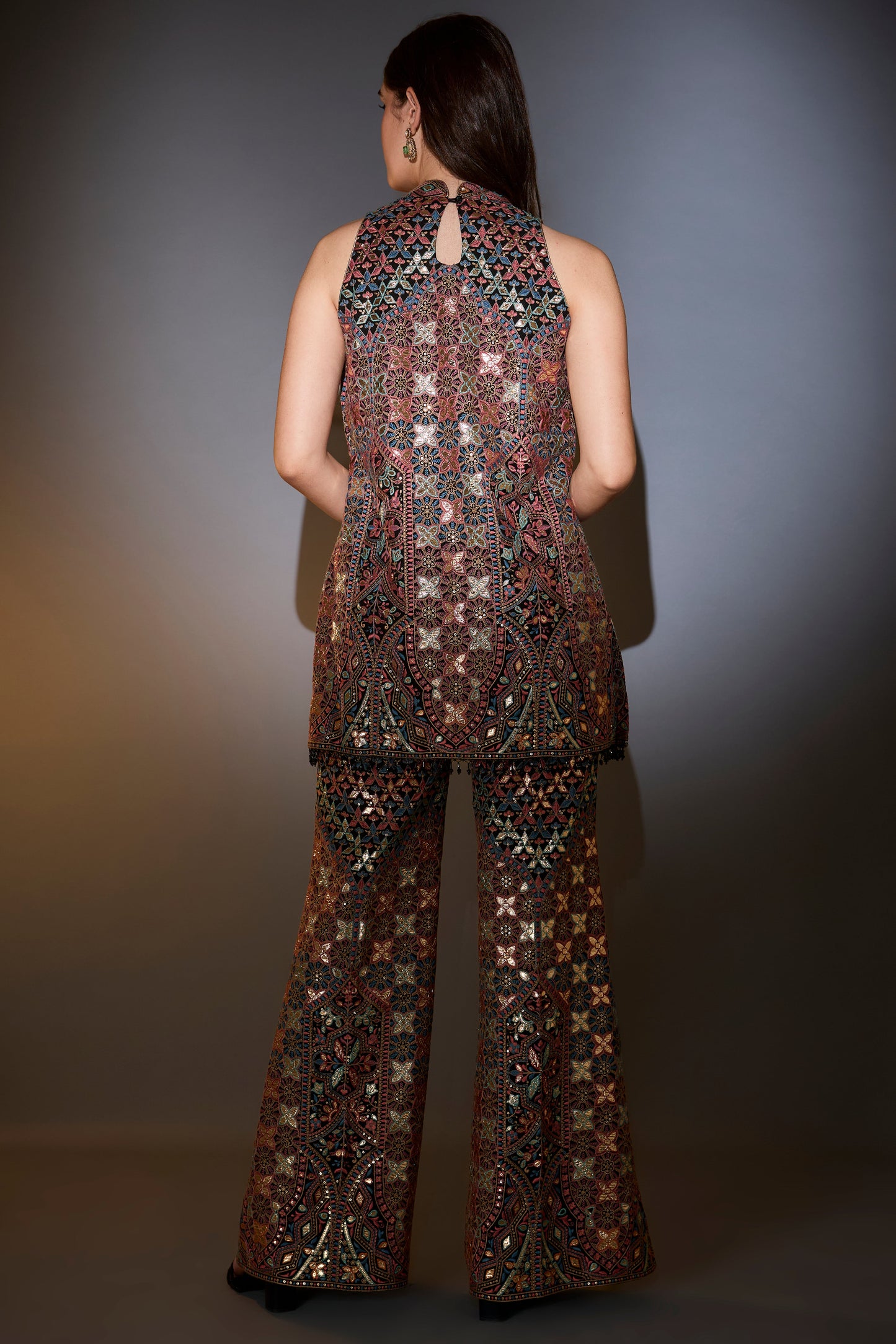 mutli coloured leather patch work co ord set paired with boot cut trousers