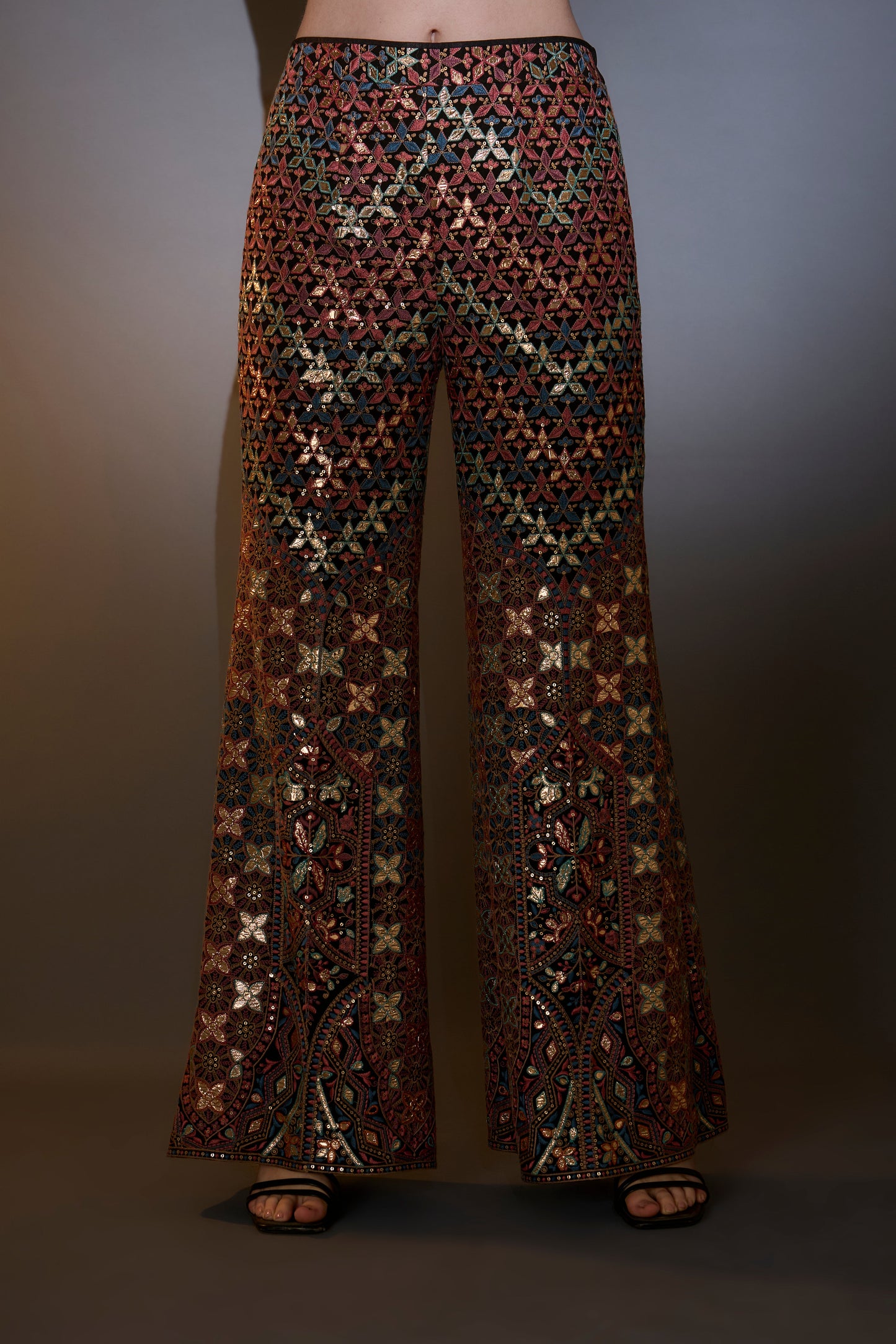 mutli coloured leather patch work co ord set paired with boot cut trousers