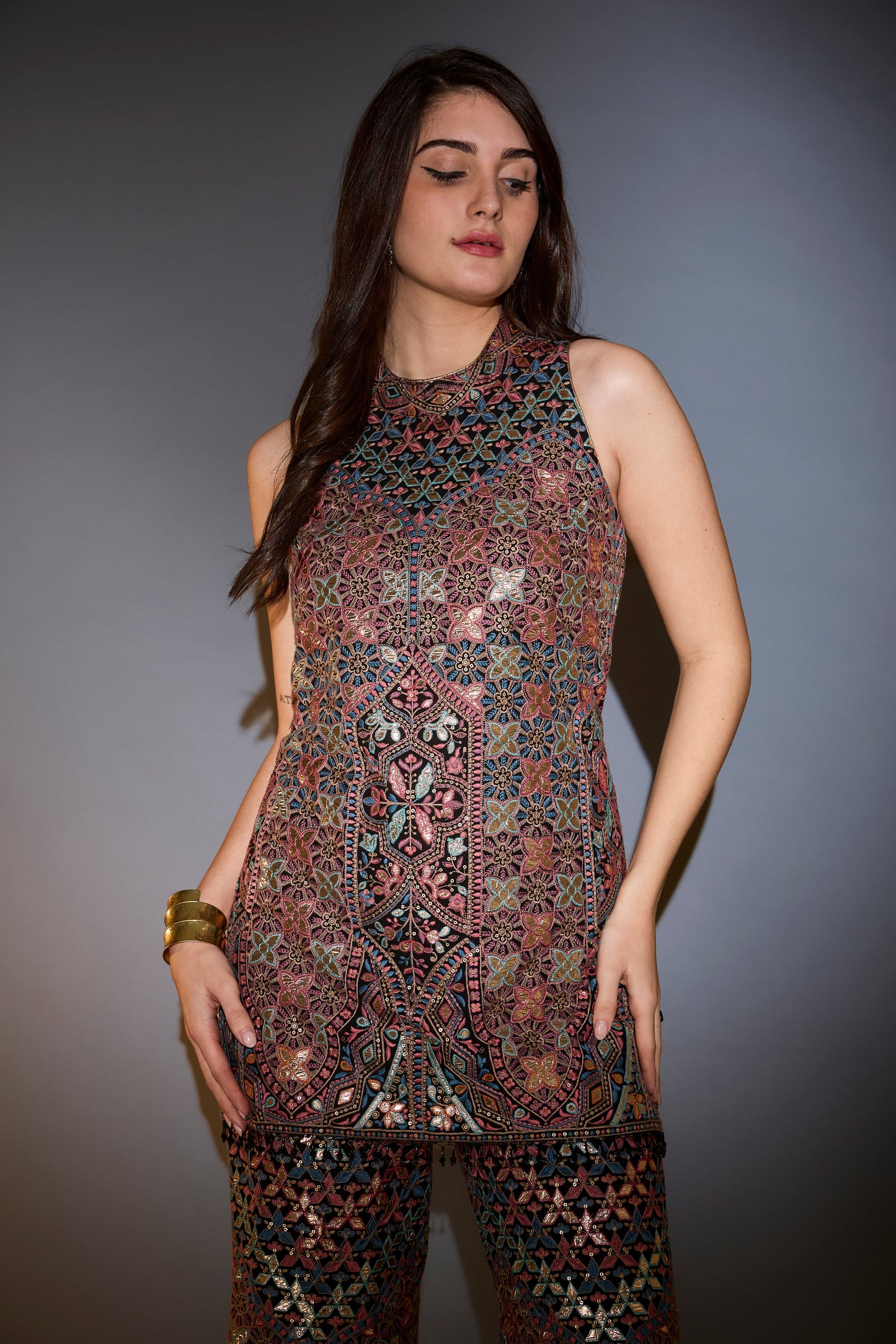 mutli coloured leather patch work co ord set paired with boot cut trousers