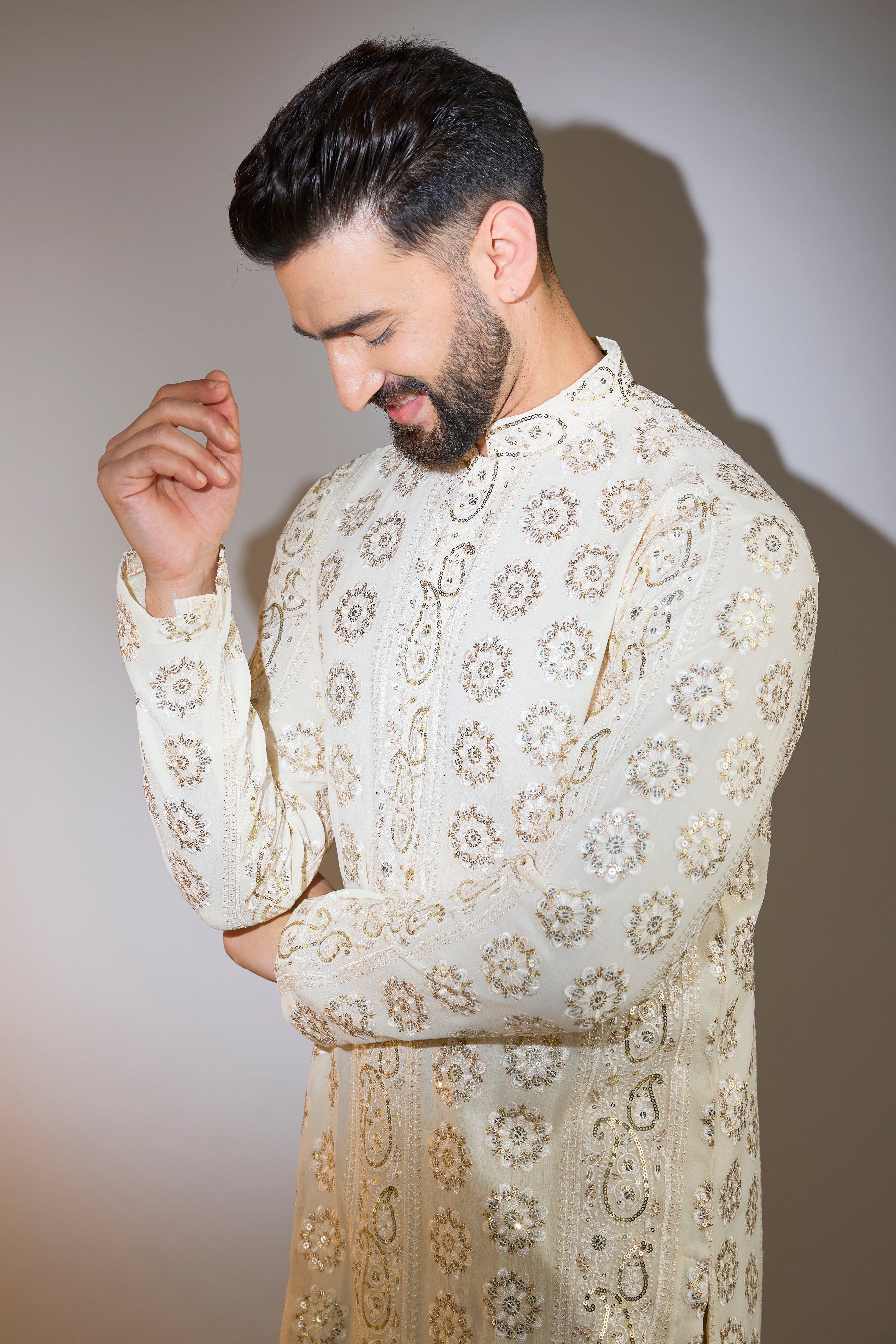 beige chikabkari kurta with sequin deatiling