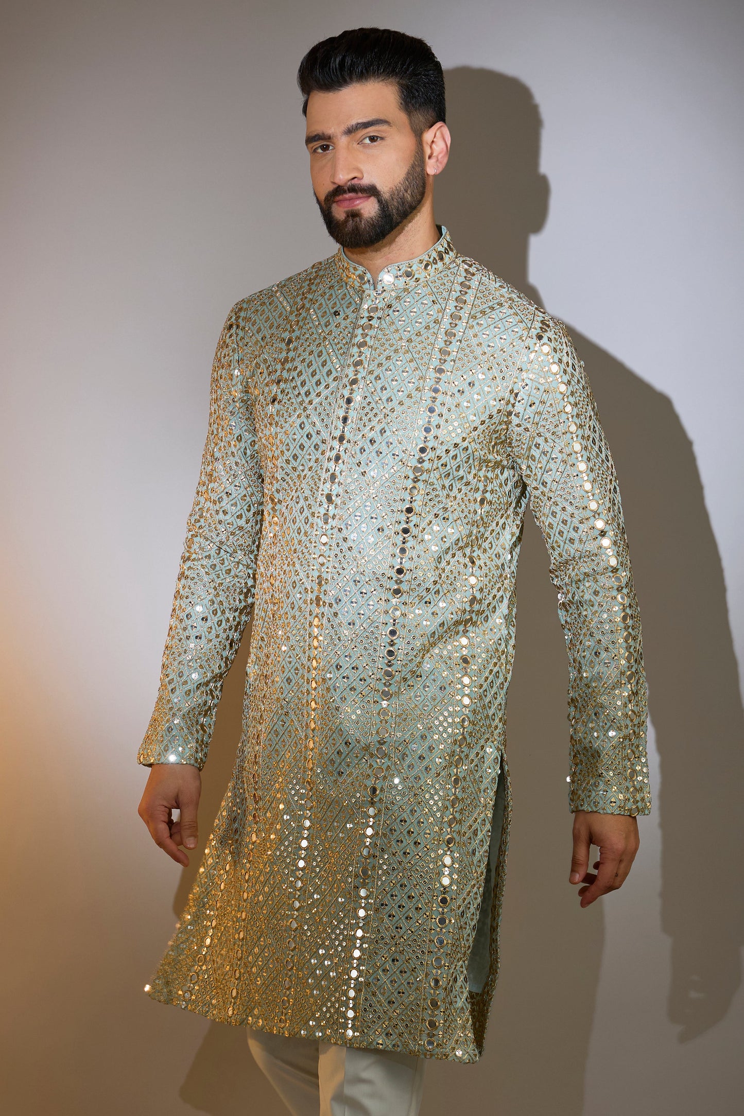 blue mirror work kurta with heazy zari detailing