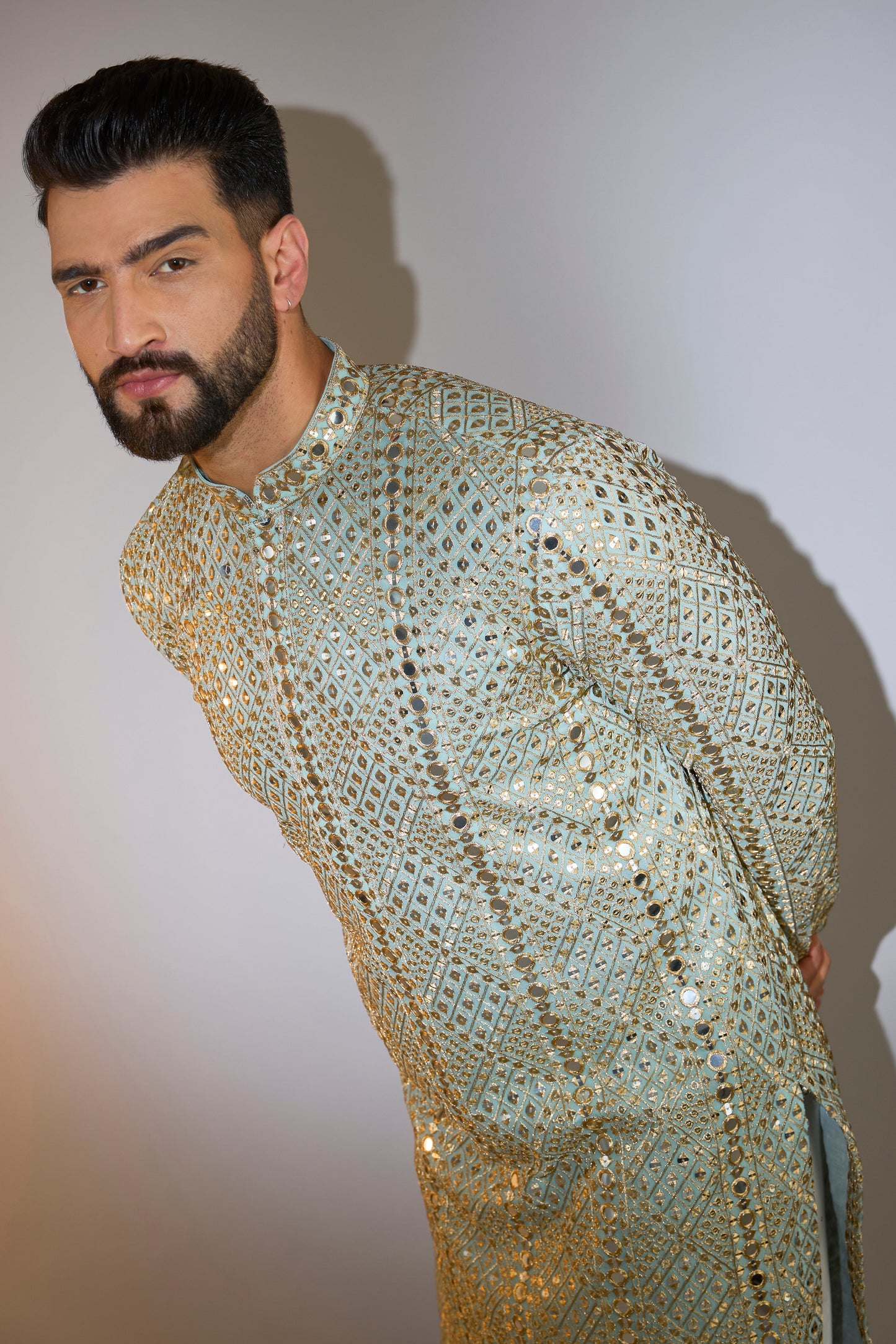 blue mirror work kurta with heazy zari detailing