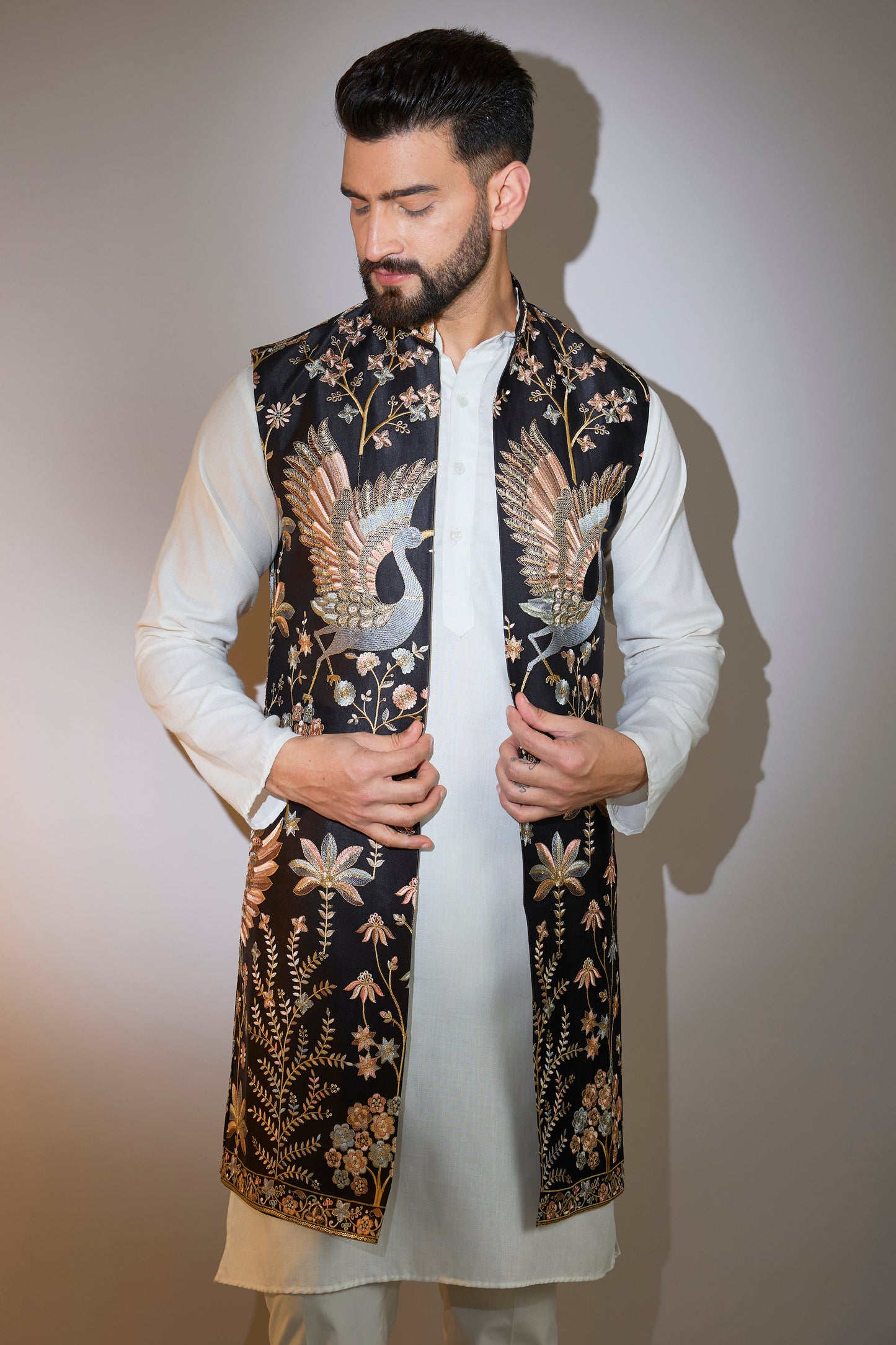 black long open shrug with detailed flora and fauna motifs