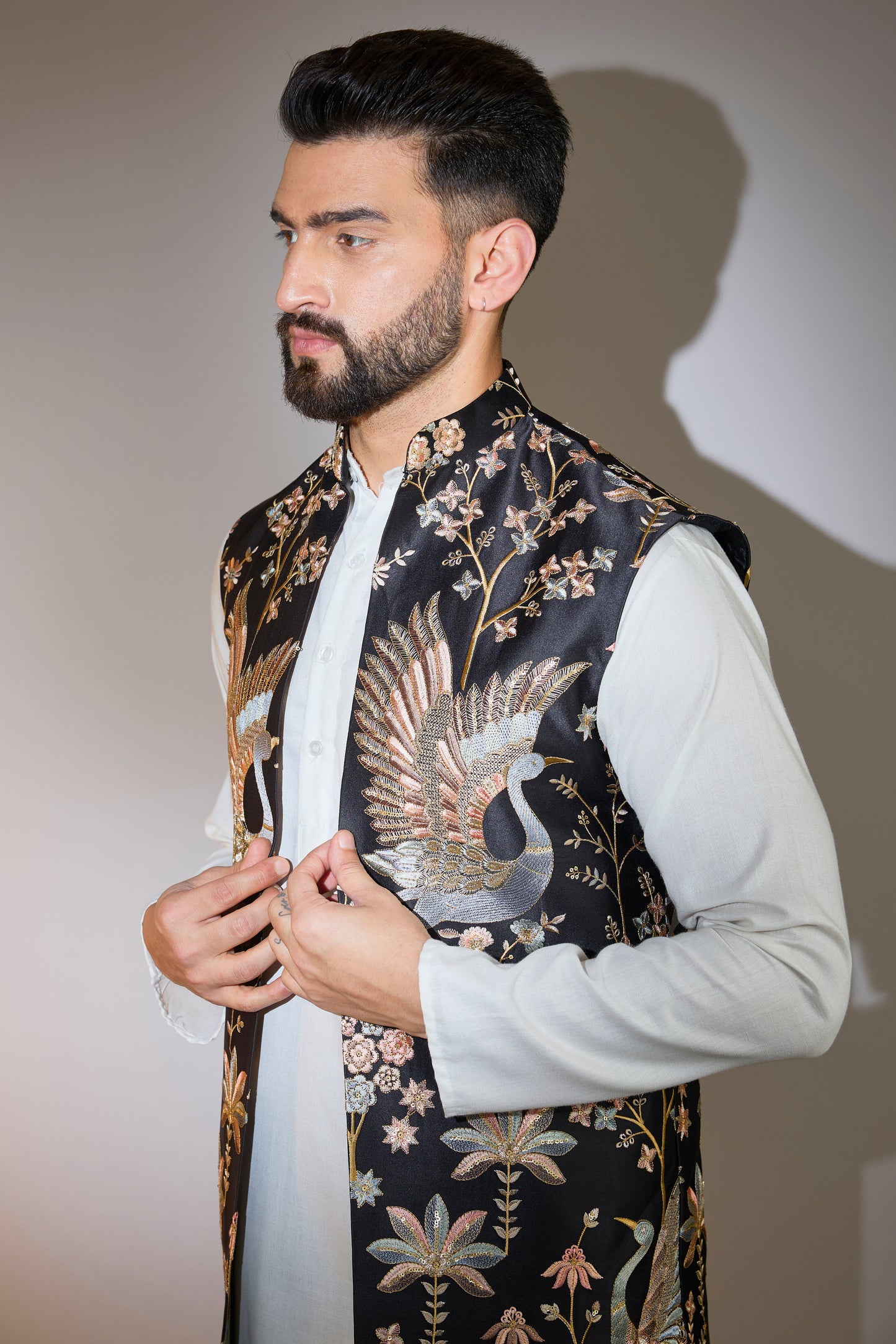 black long open shrug with detailed flora and fauna motifs