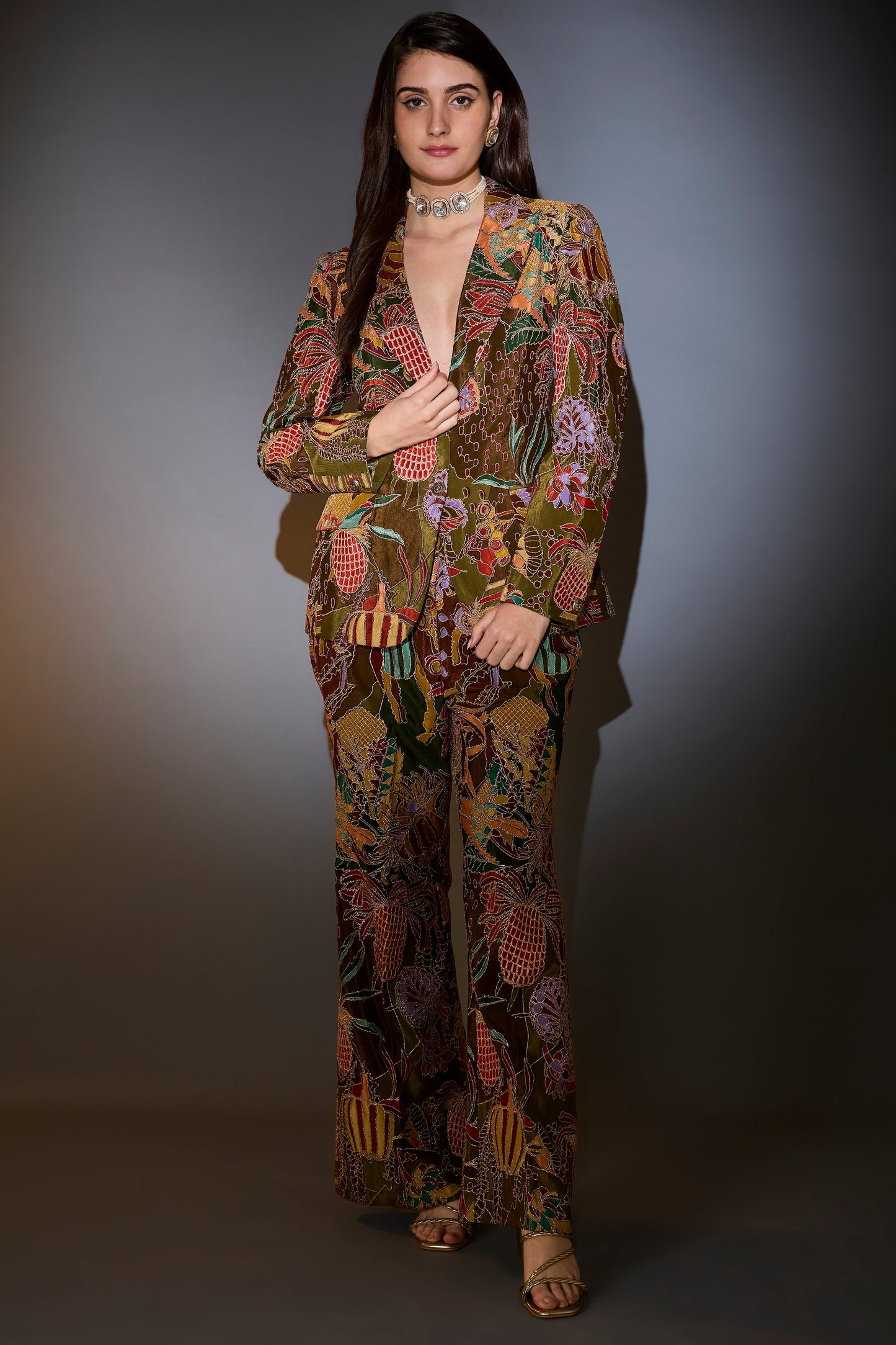 mehndi green blazer set with abstract embroidery and intricate aari work