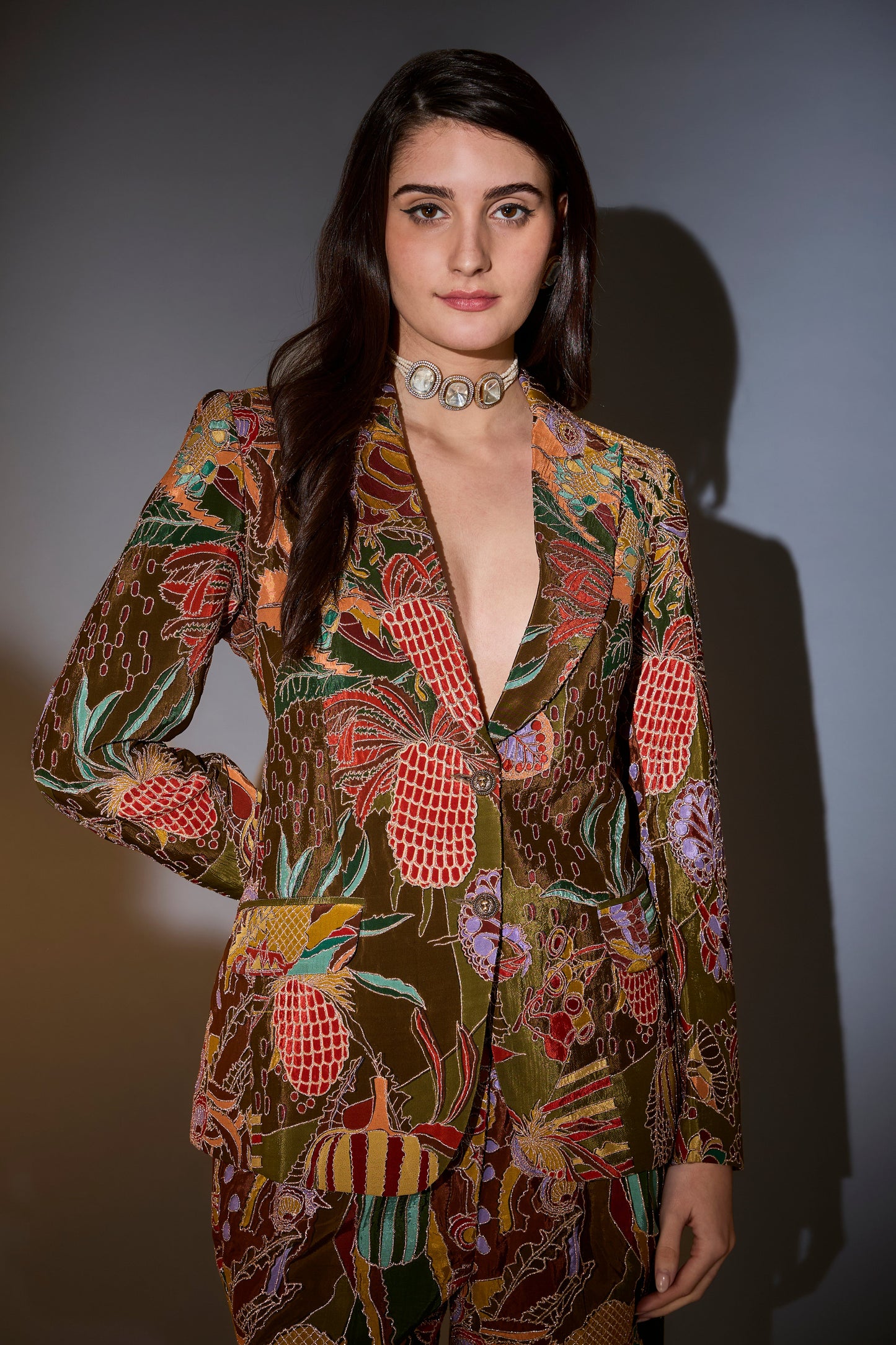 mehndi green blazer set with abstract embroidery and intricate aari work