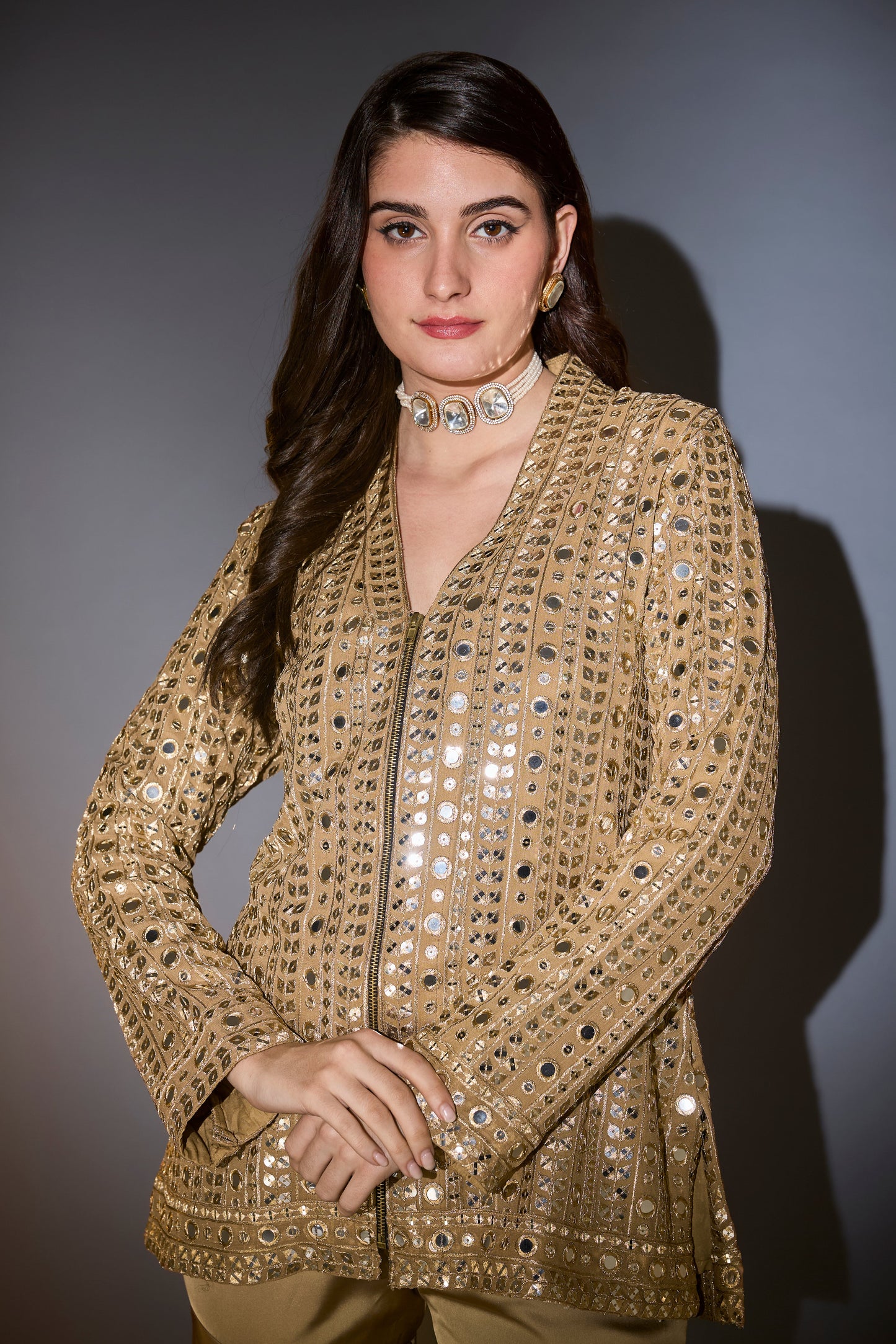 golden copper mirror work garara set complimented with zipper