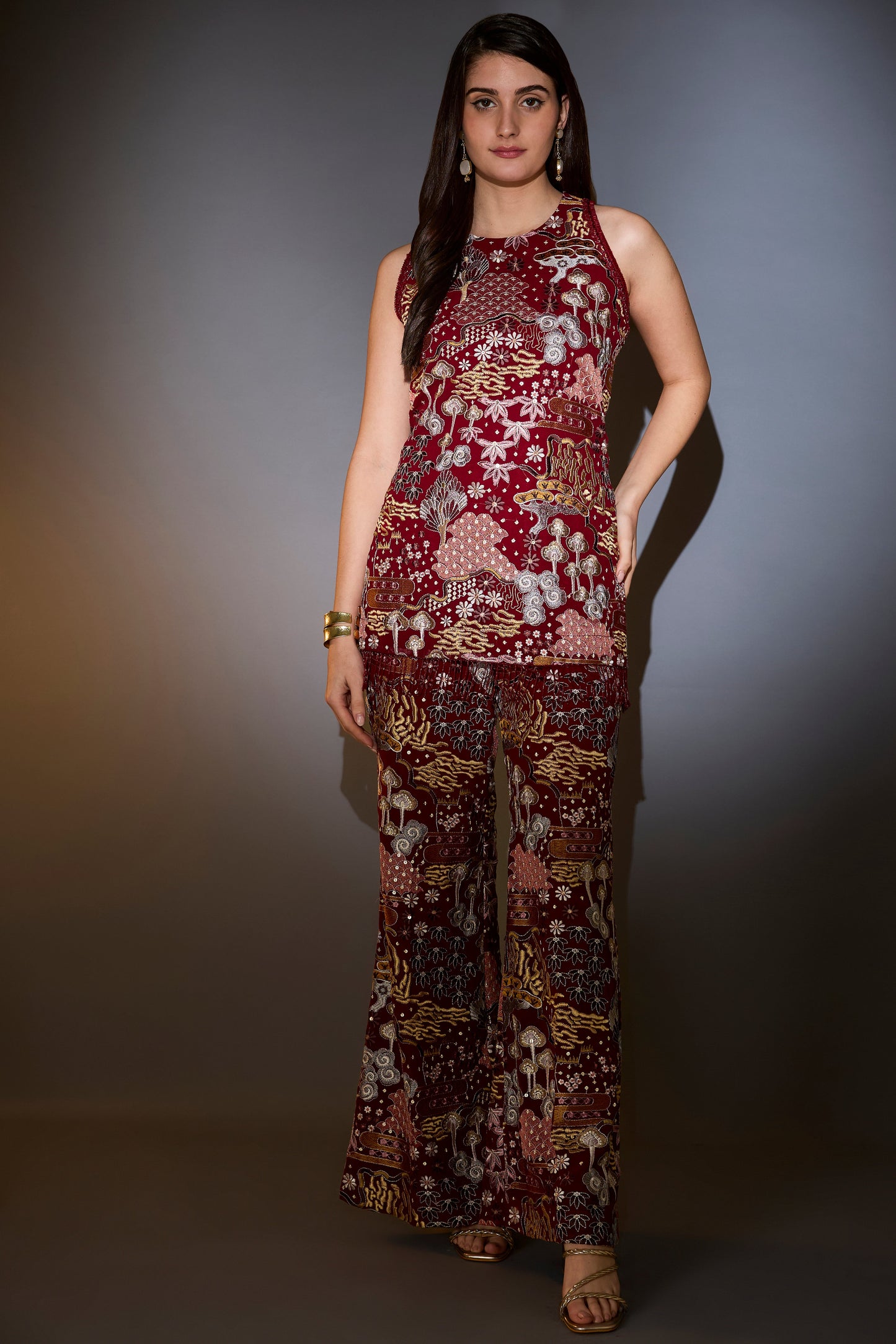 deep red co ord set with intricate multi floral embroidery embellished with bead tassels