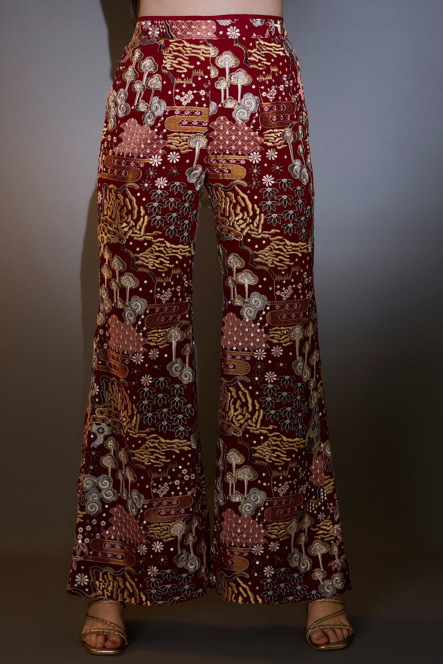 deep red co ord set with intricate multi floral embroidery embellished with bead tassels