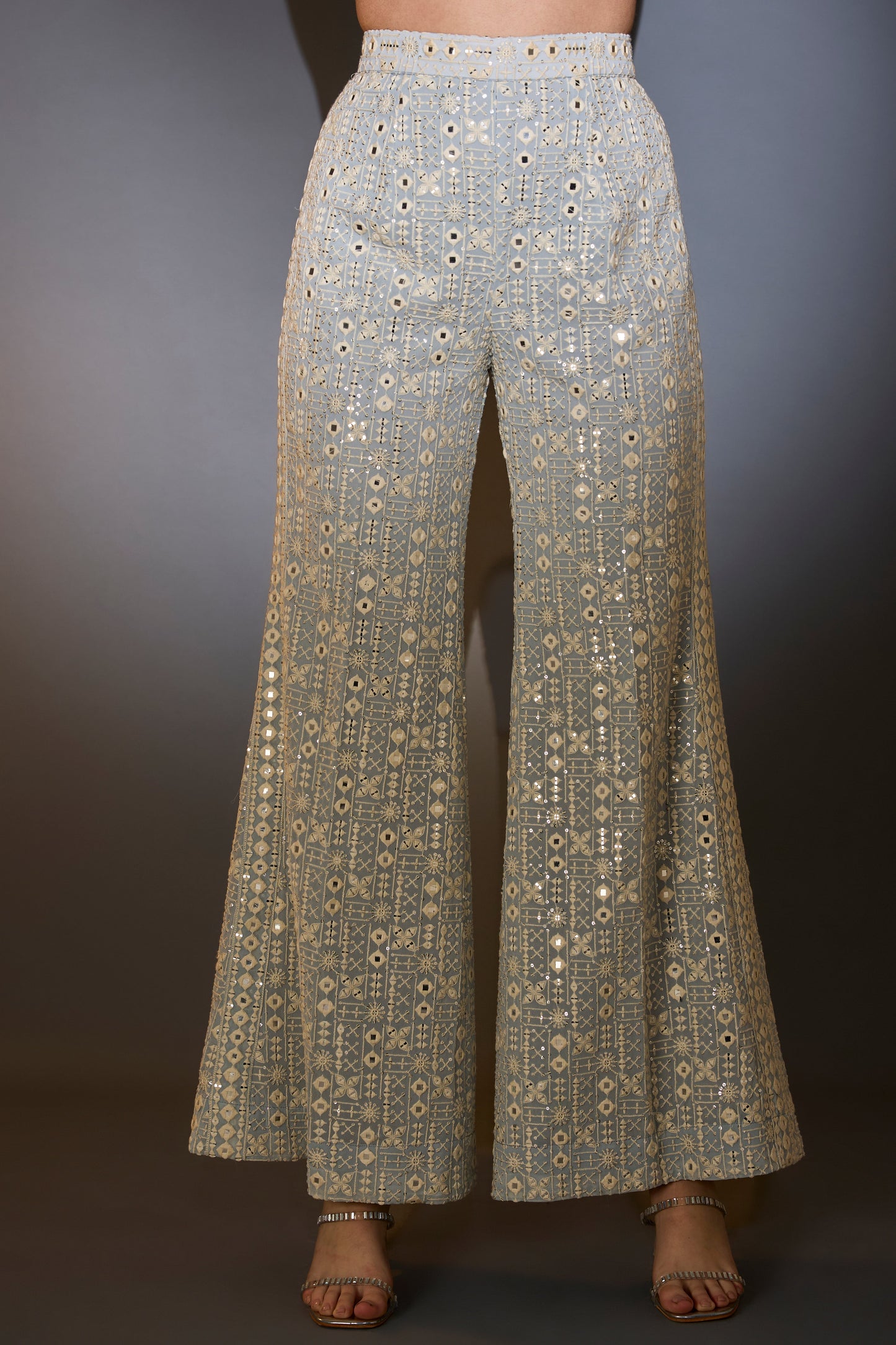 powder blue co ord set with thread mirror and sequin work with detailed edgings embellished tassles