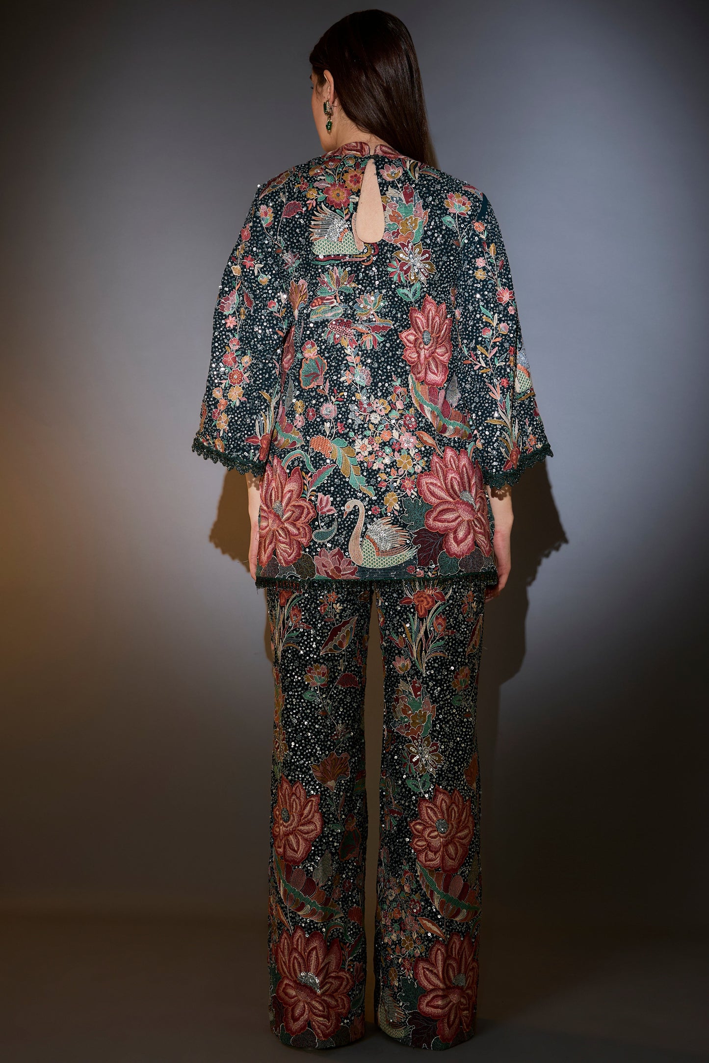 this co ord comes with heavy sequin and multi thread work with intricate flora and fauna embroidery