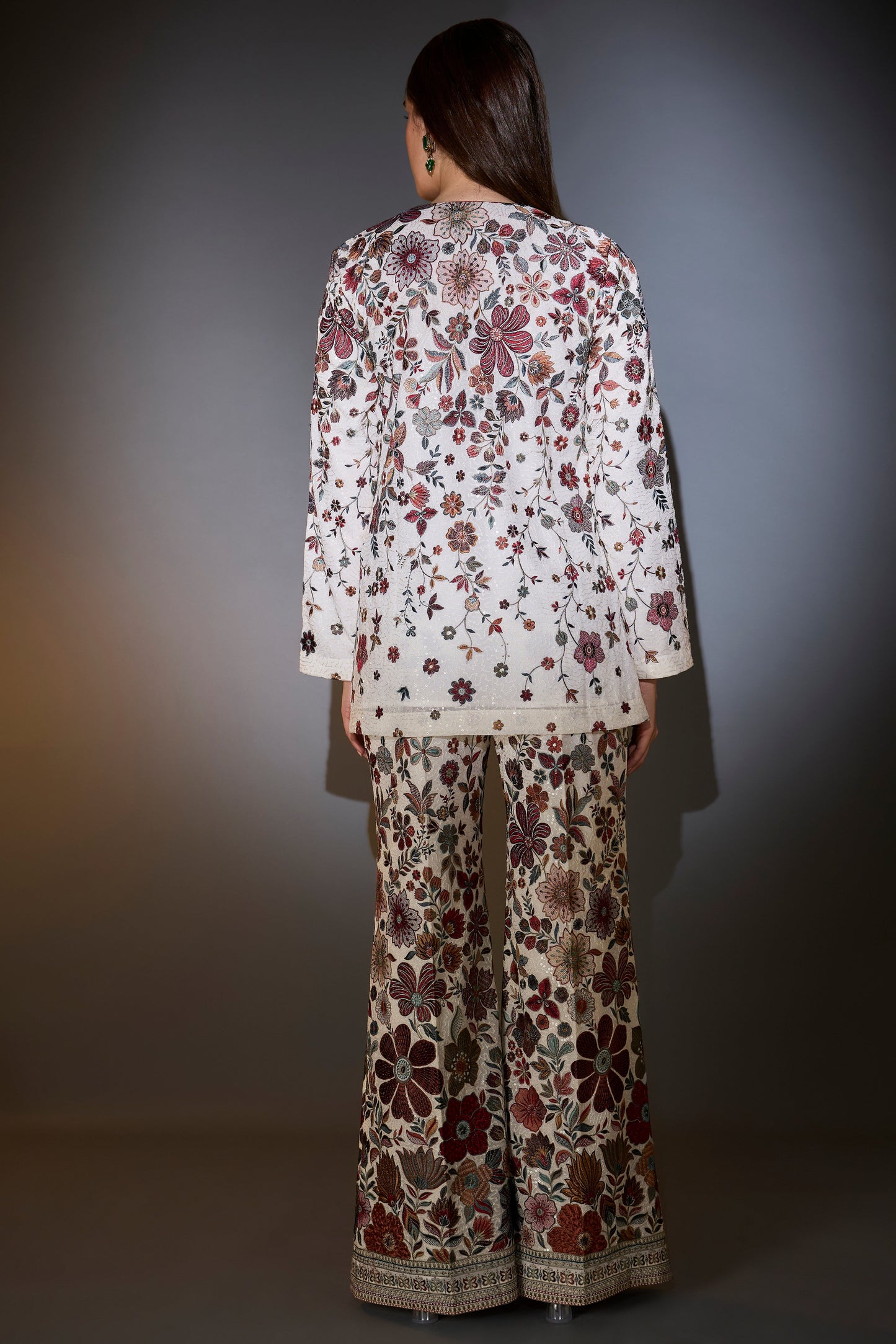 ivory co ord set with heavy multi thread floral embroidery and sprinkle and sequin work