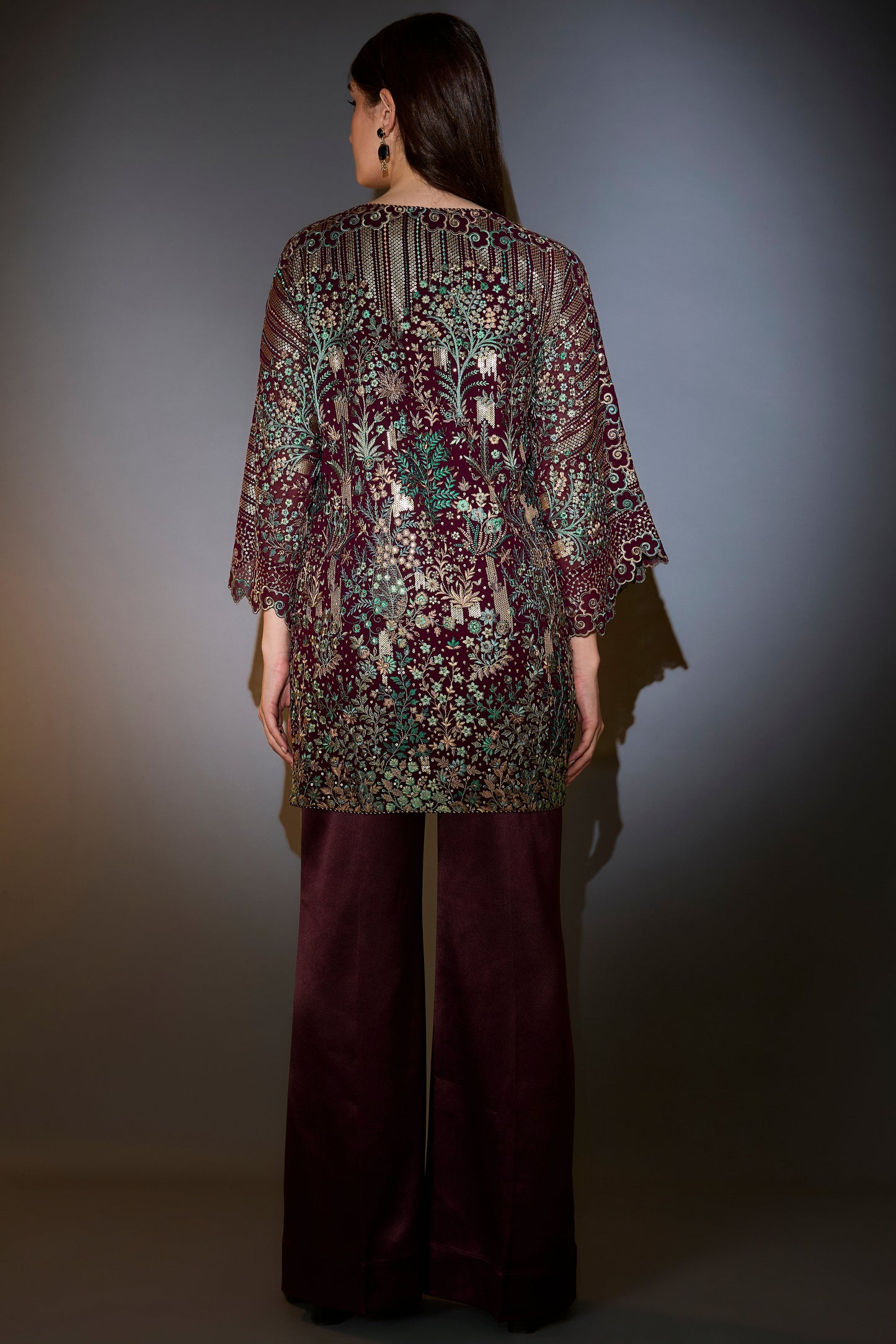 wine co ord set with heavy multi thread embroidery and flora and fauna motifs