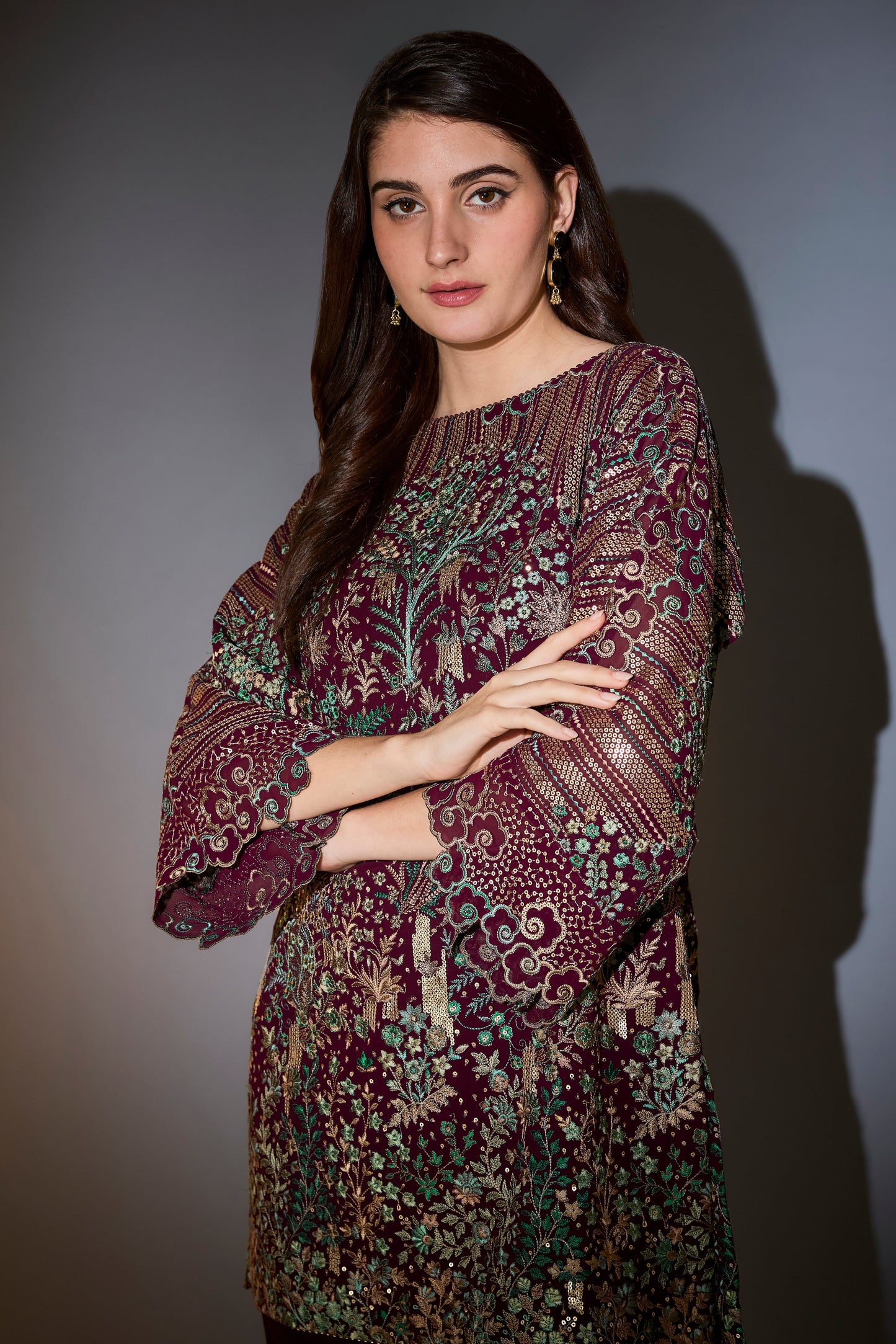 wine co ord set with heavy multi thread embroidery and flora and fauna motifs