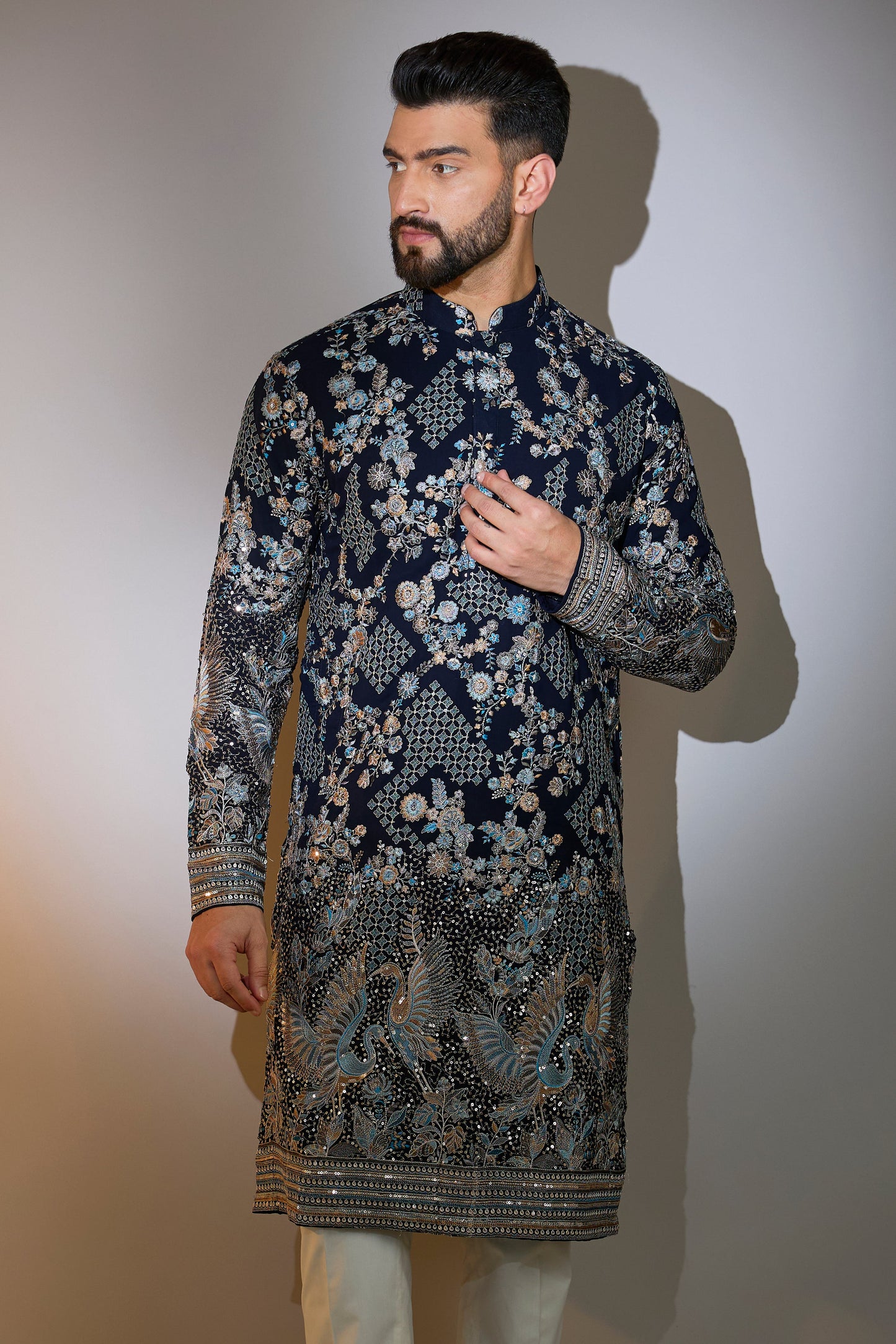 blue chikankari kurta with intriacte flora and fauna embroidery