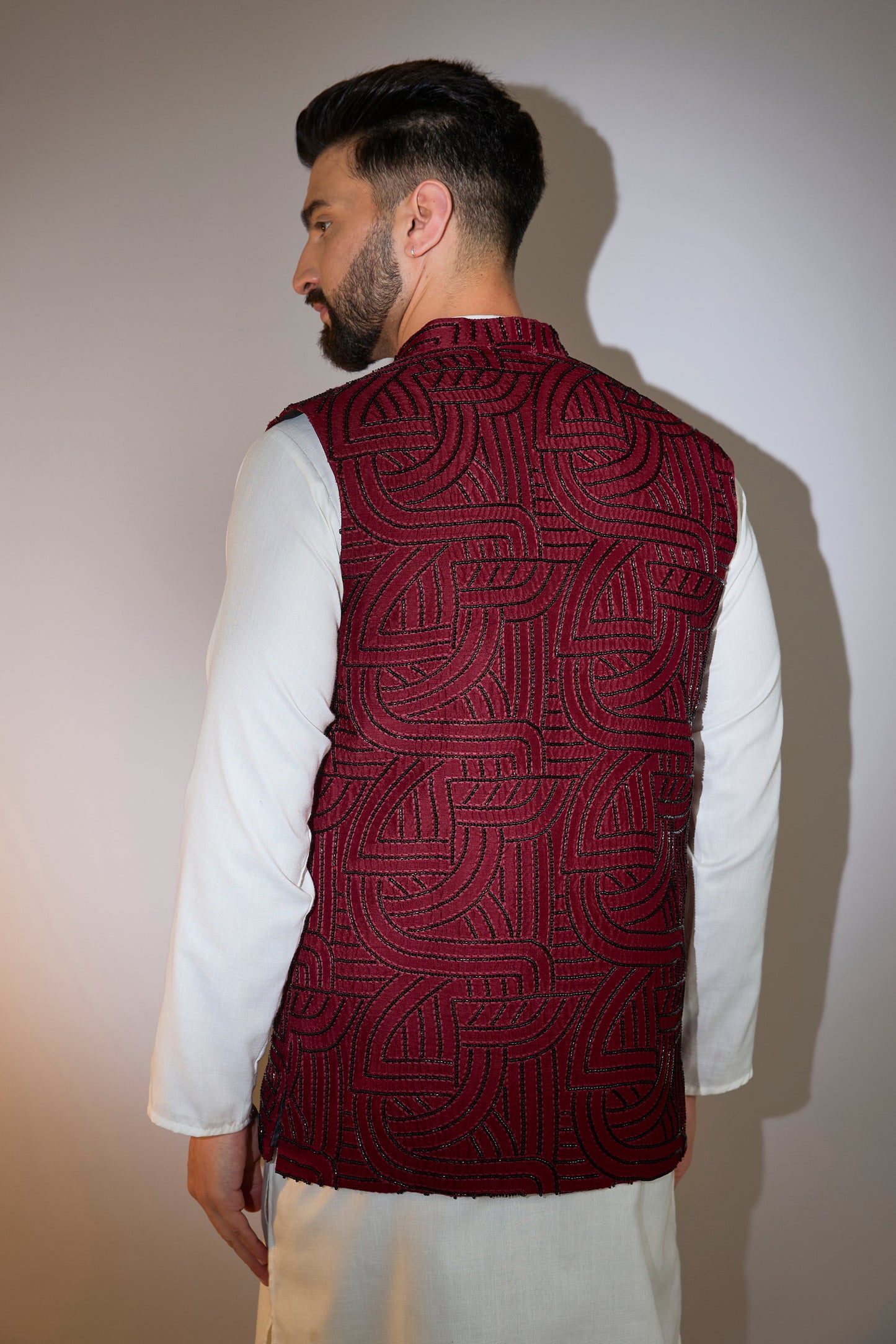 maroon short jacket with intricate cut dana embroidery