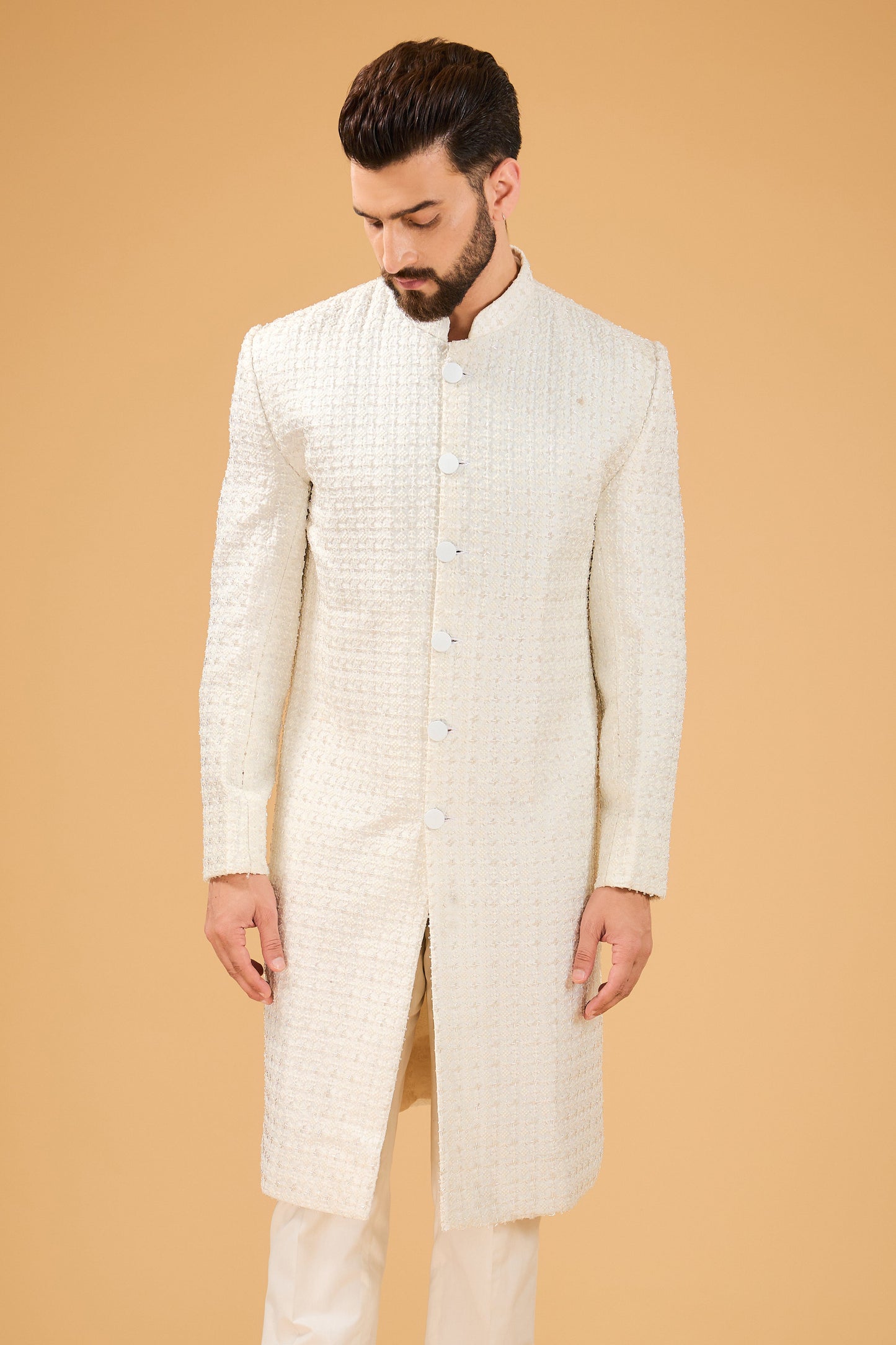 Ivory Sherwani featuring exquisite cut dana work - kasbahmen