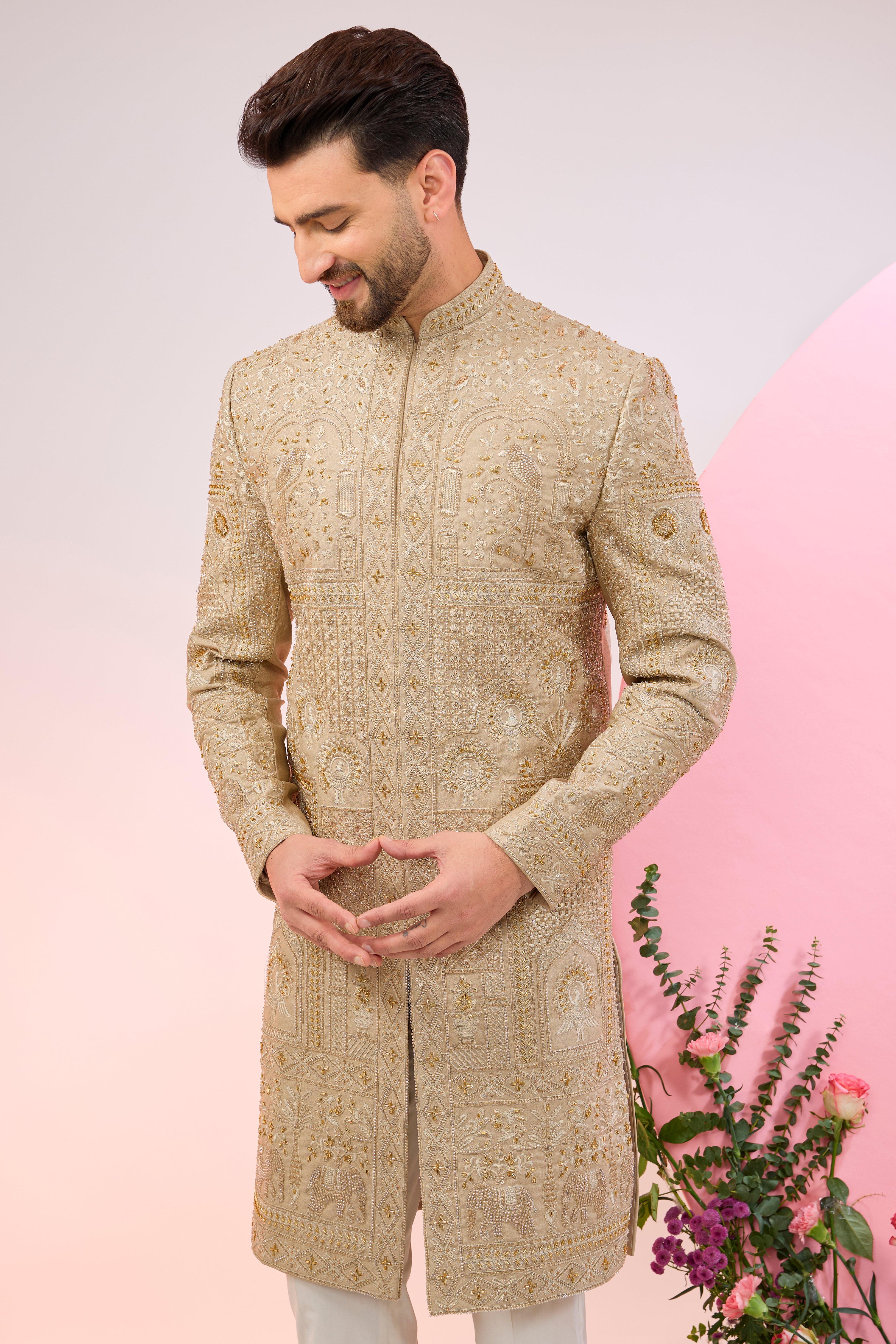 beige hand embroidered sherwani with intricate thread and cut dana embroidery