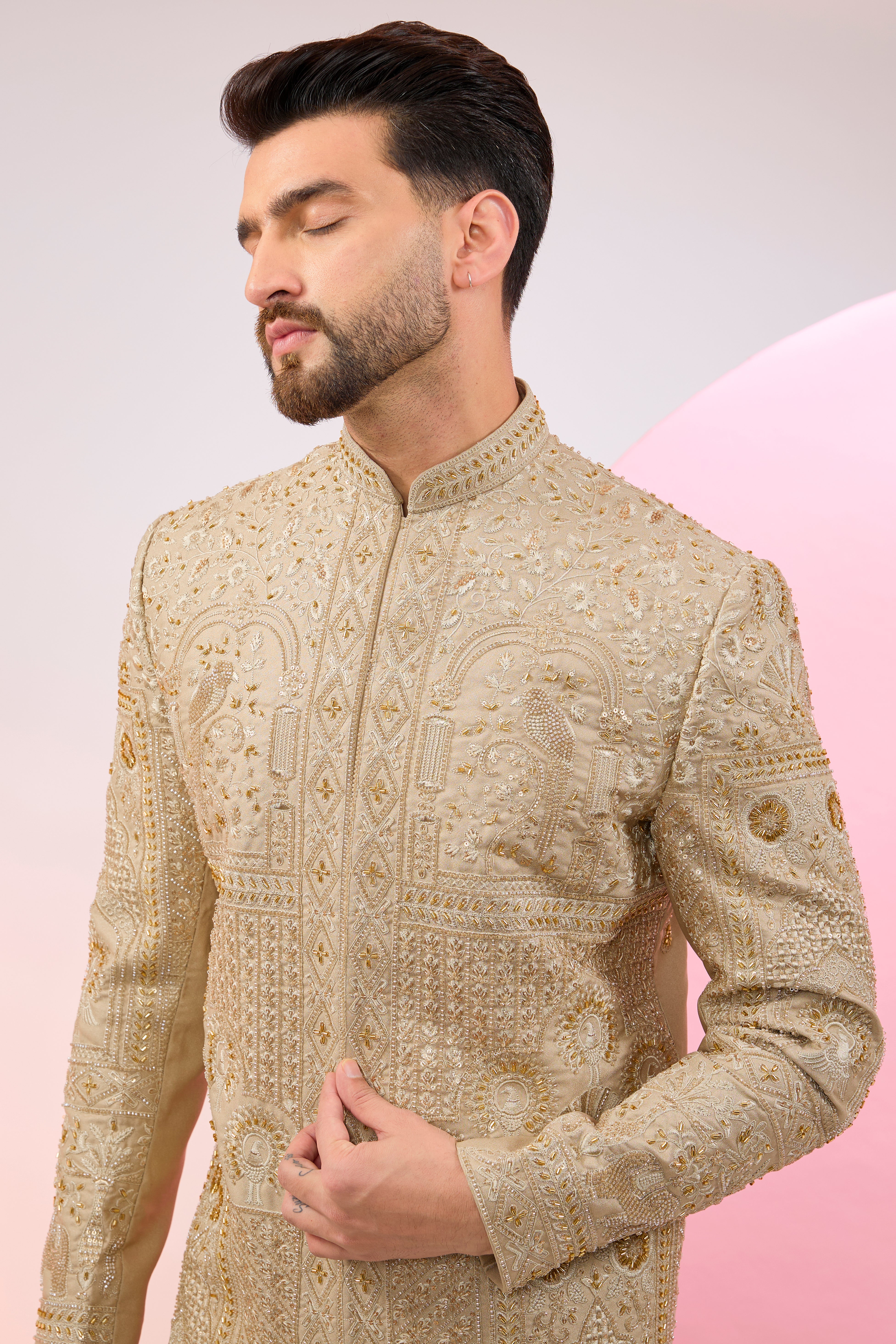 beige hand embroidered sherwani with intricate thread and cut dana embroidery
