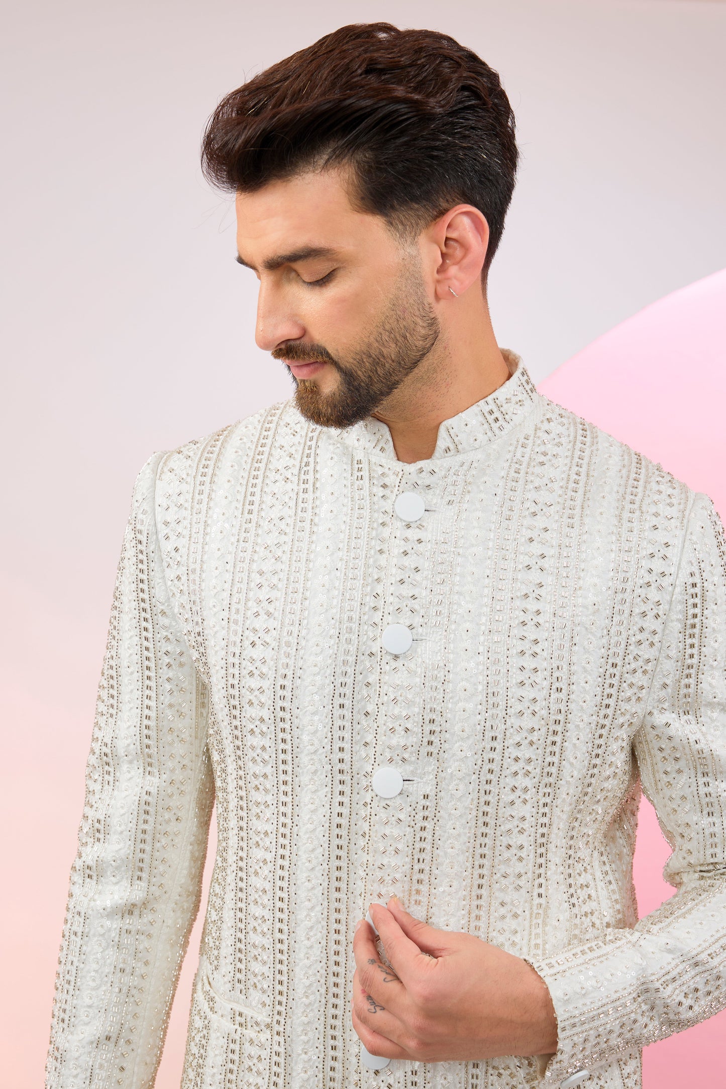 white bandhgala with heavy cut dana embroidery