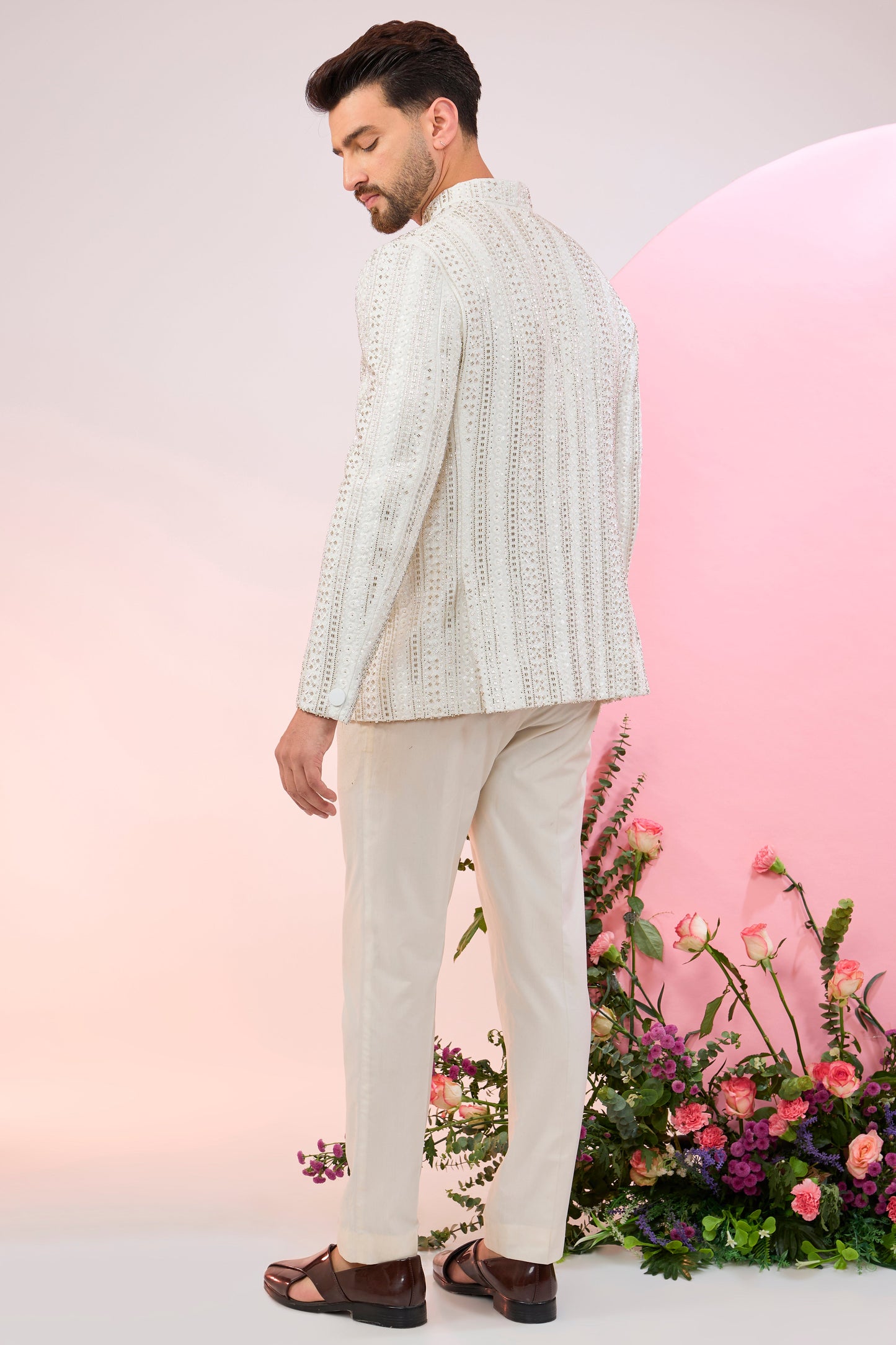 white bandhgala with heavy cut dana embroidery