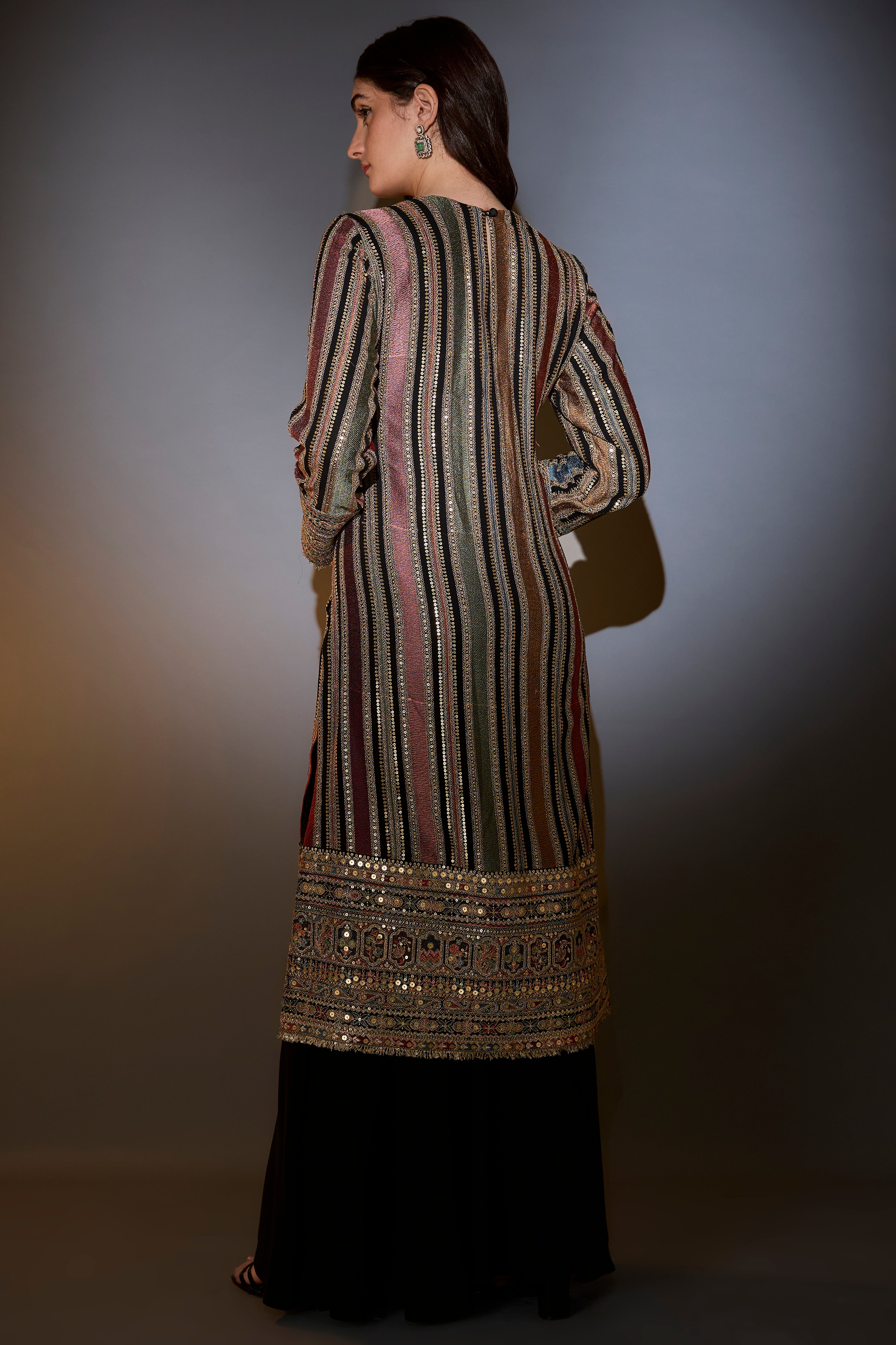 multi color striped suit with intricately done thread and zari work paired with sharara and dupatta