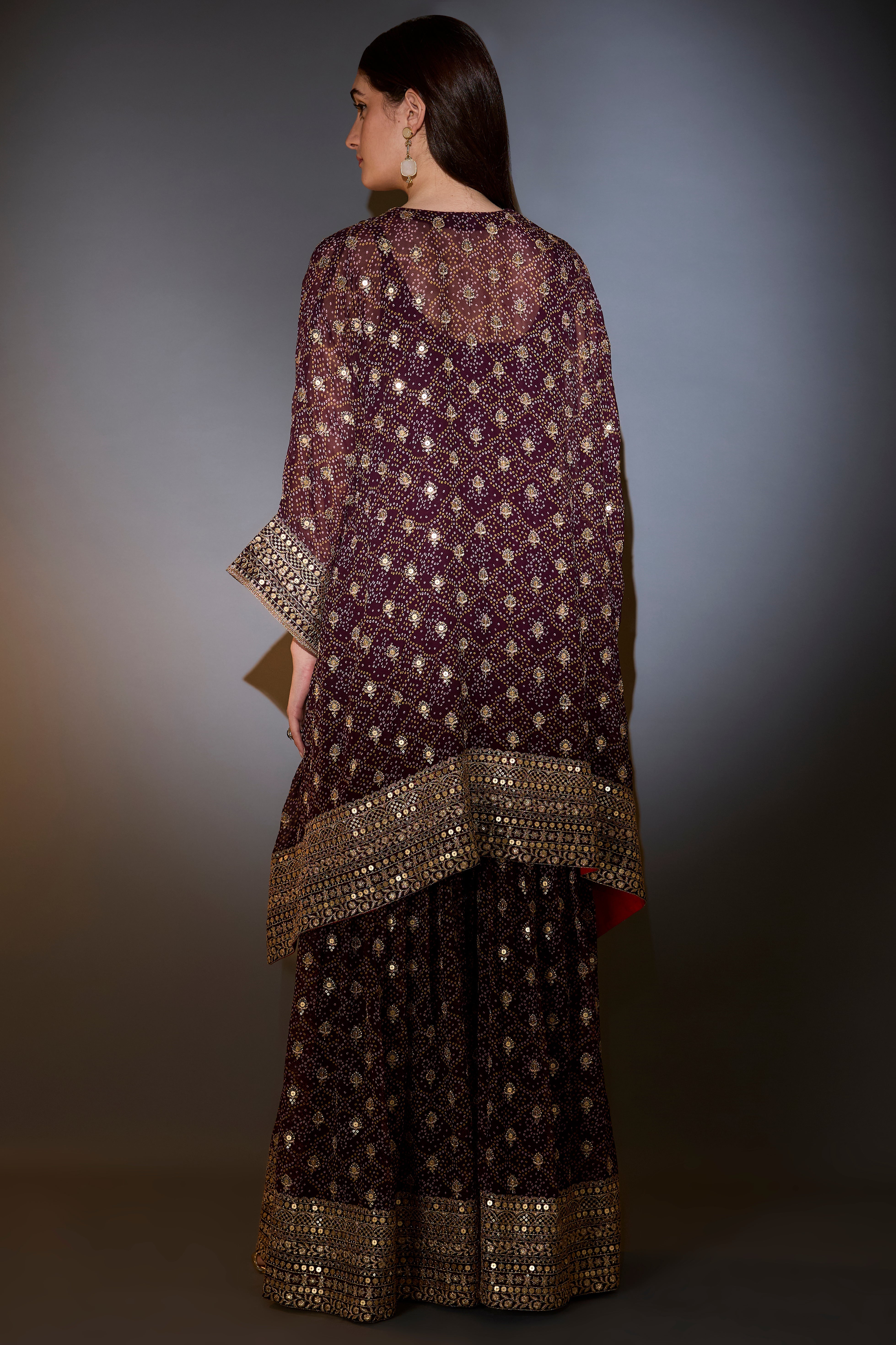 wine kaftan with sharara with intricate aari and sequins work on the neck ghera and bottom