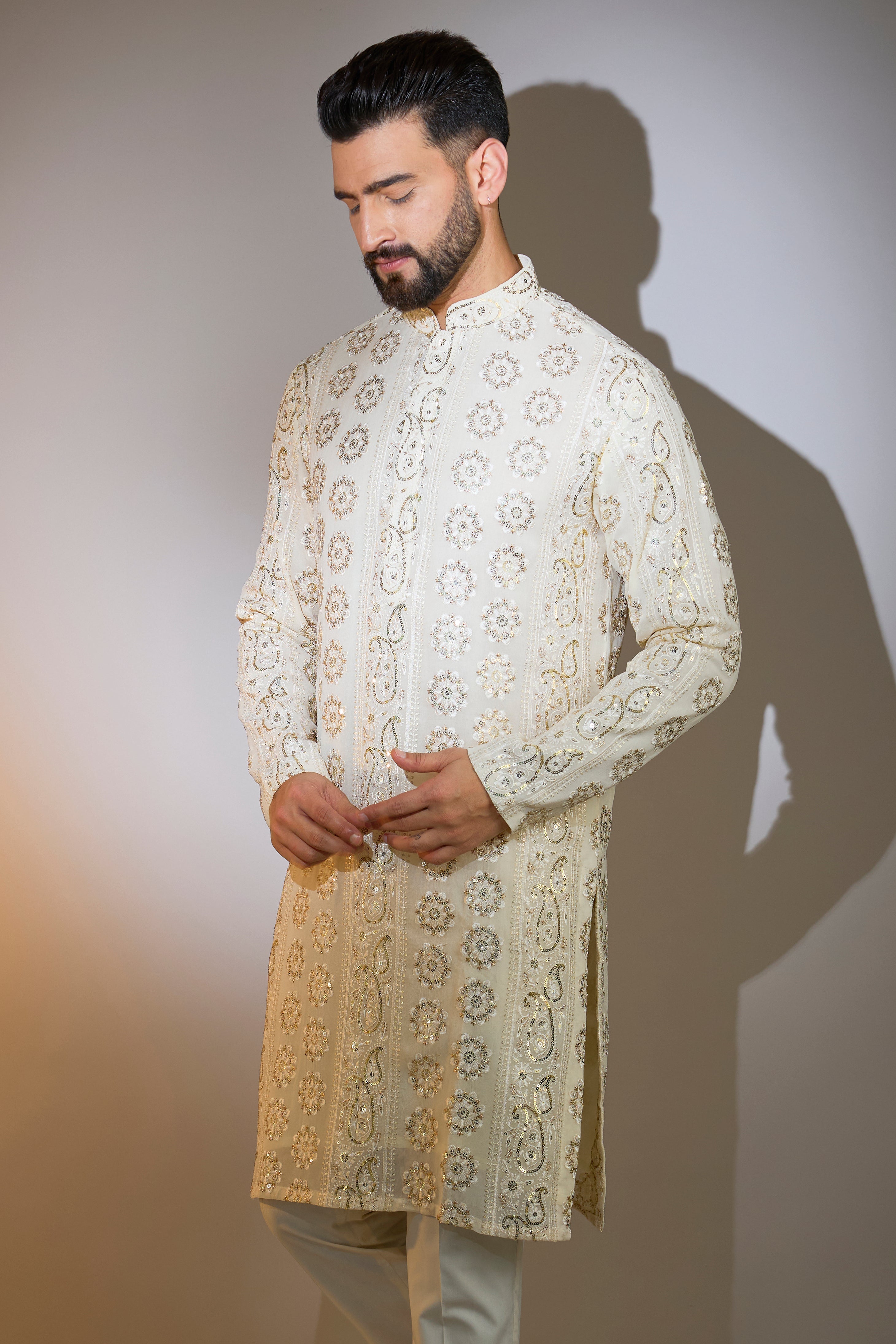 beige chikabkari kurta with sequin deatiling