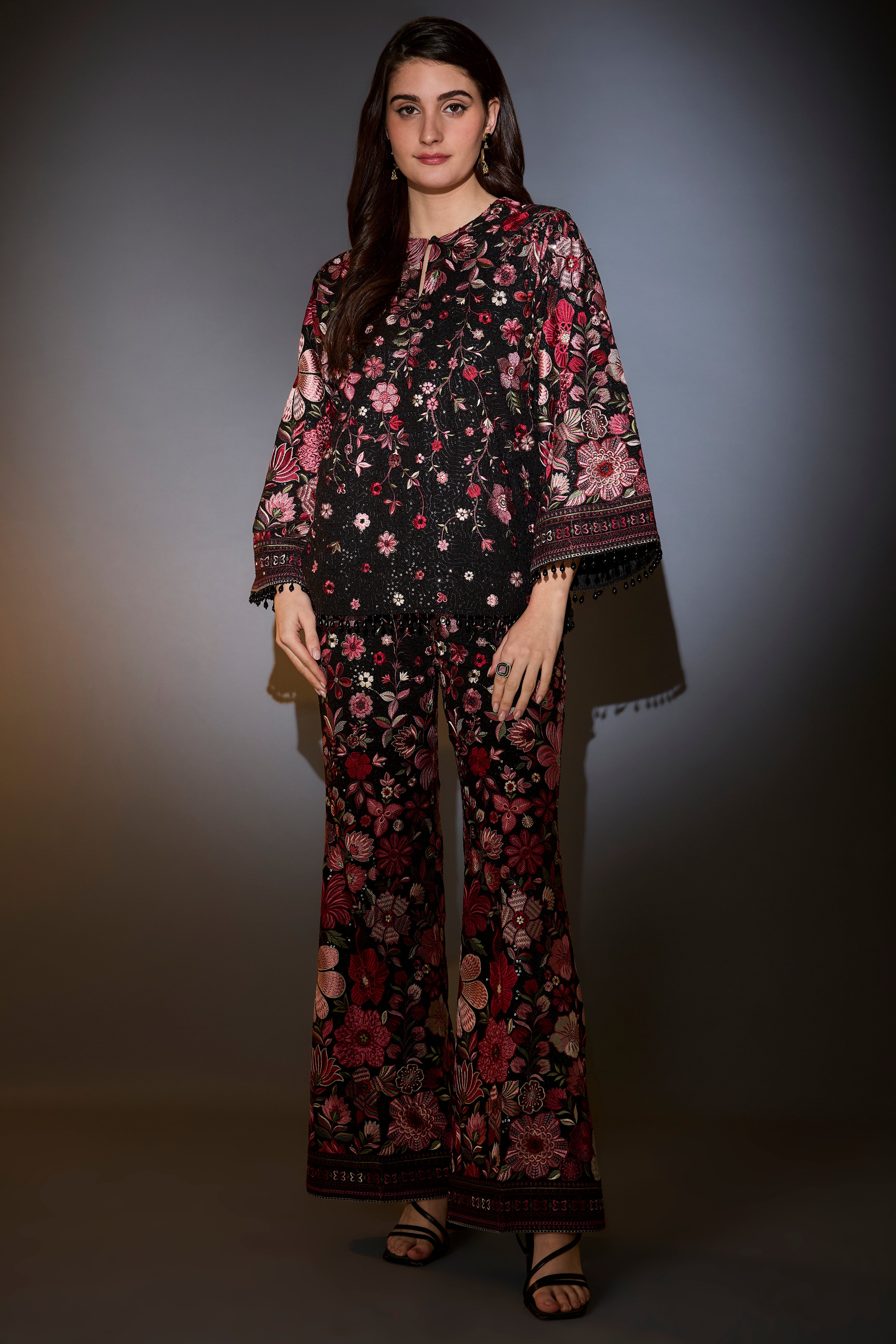 multi coloured floral tunic set with boot cut trousers