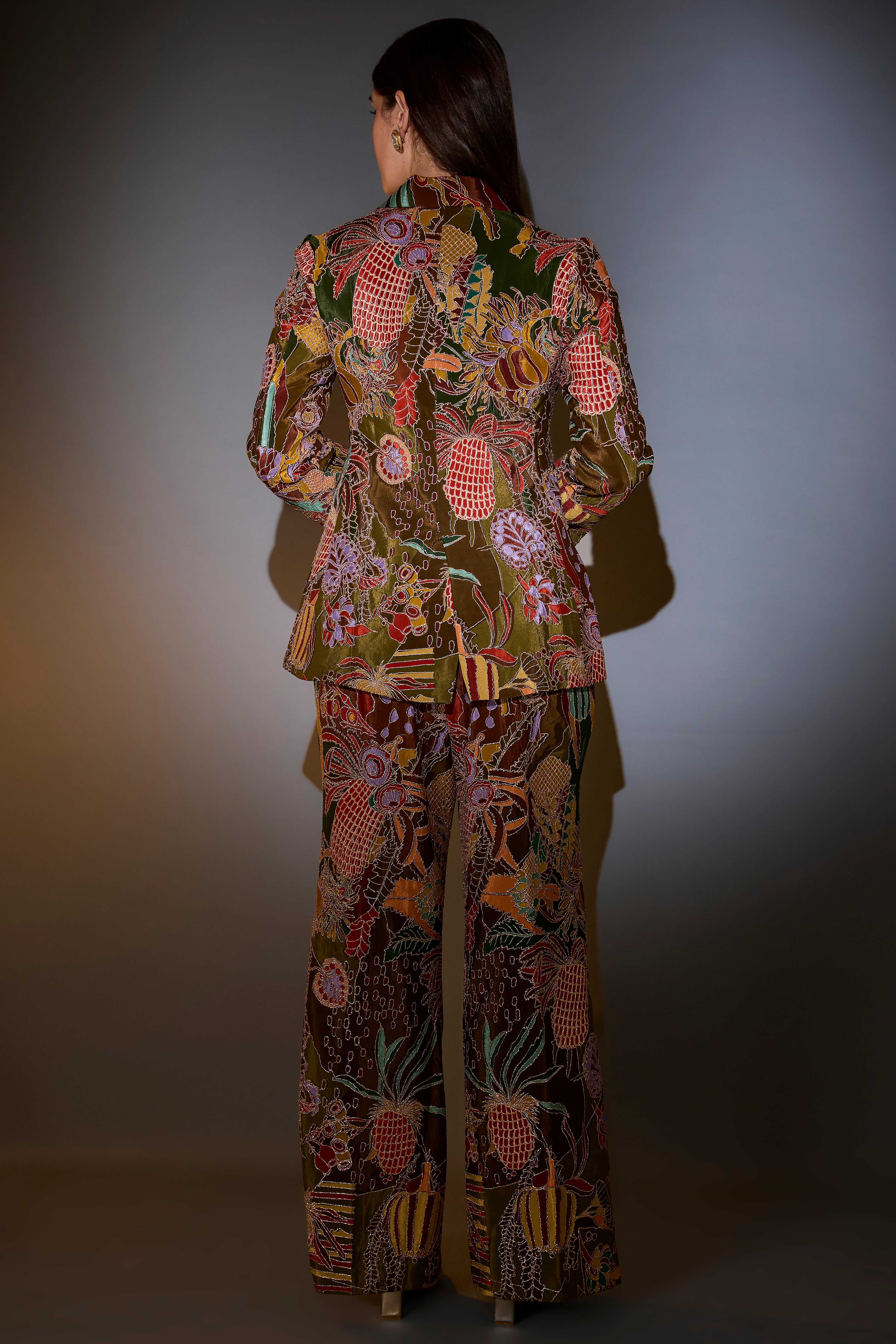 mehndi green blazer set with abstract embroidery and intricate aari work