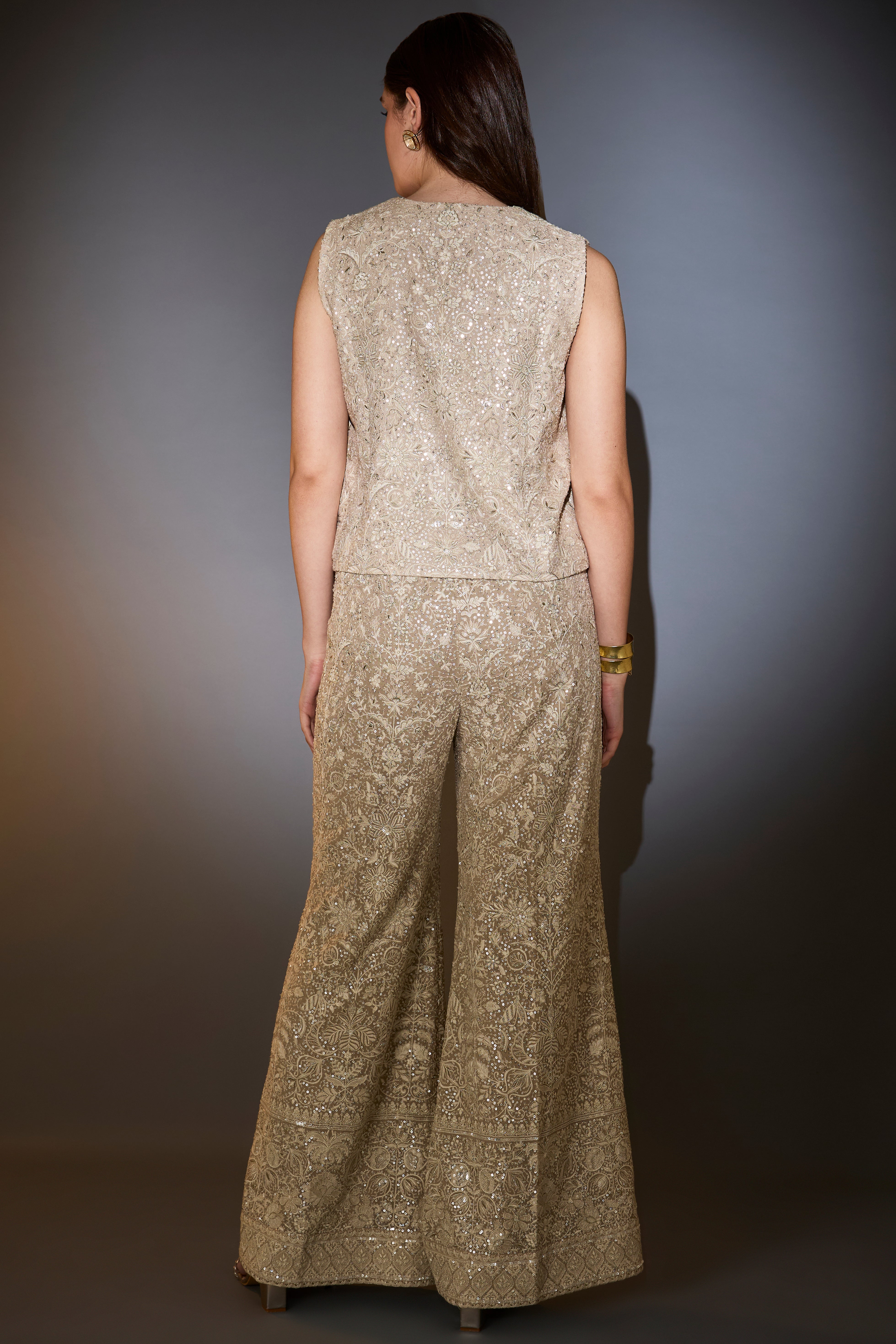 mouse colored co ord set including waist jacket and boot cut trousers adorned in intricate ivory thread and sequin embroidery