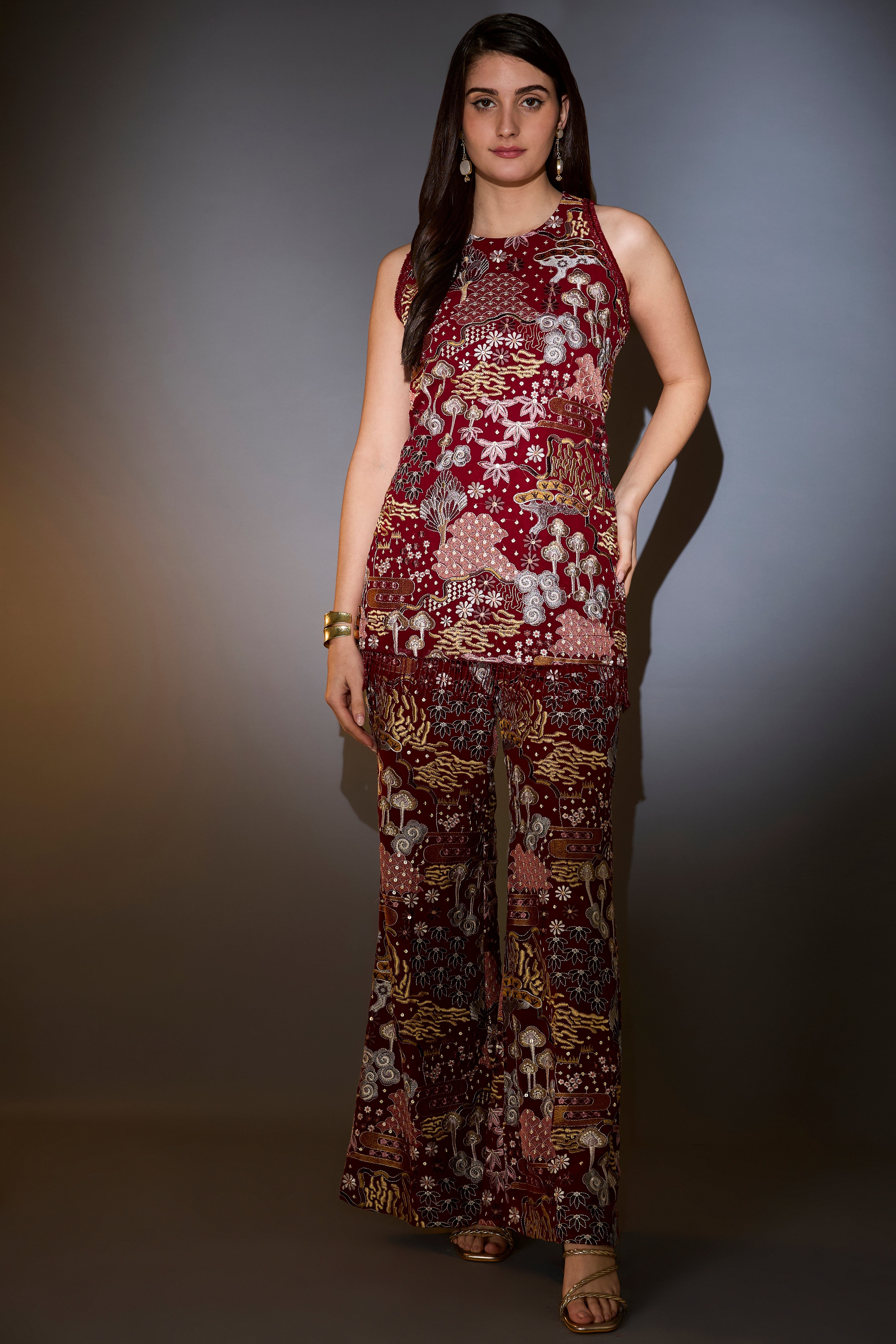 deep red co ord set with intricate multi floral embroidery embellished with bead tassels
