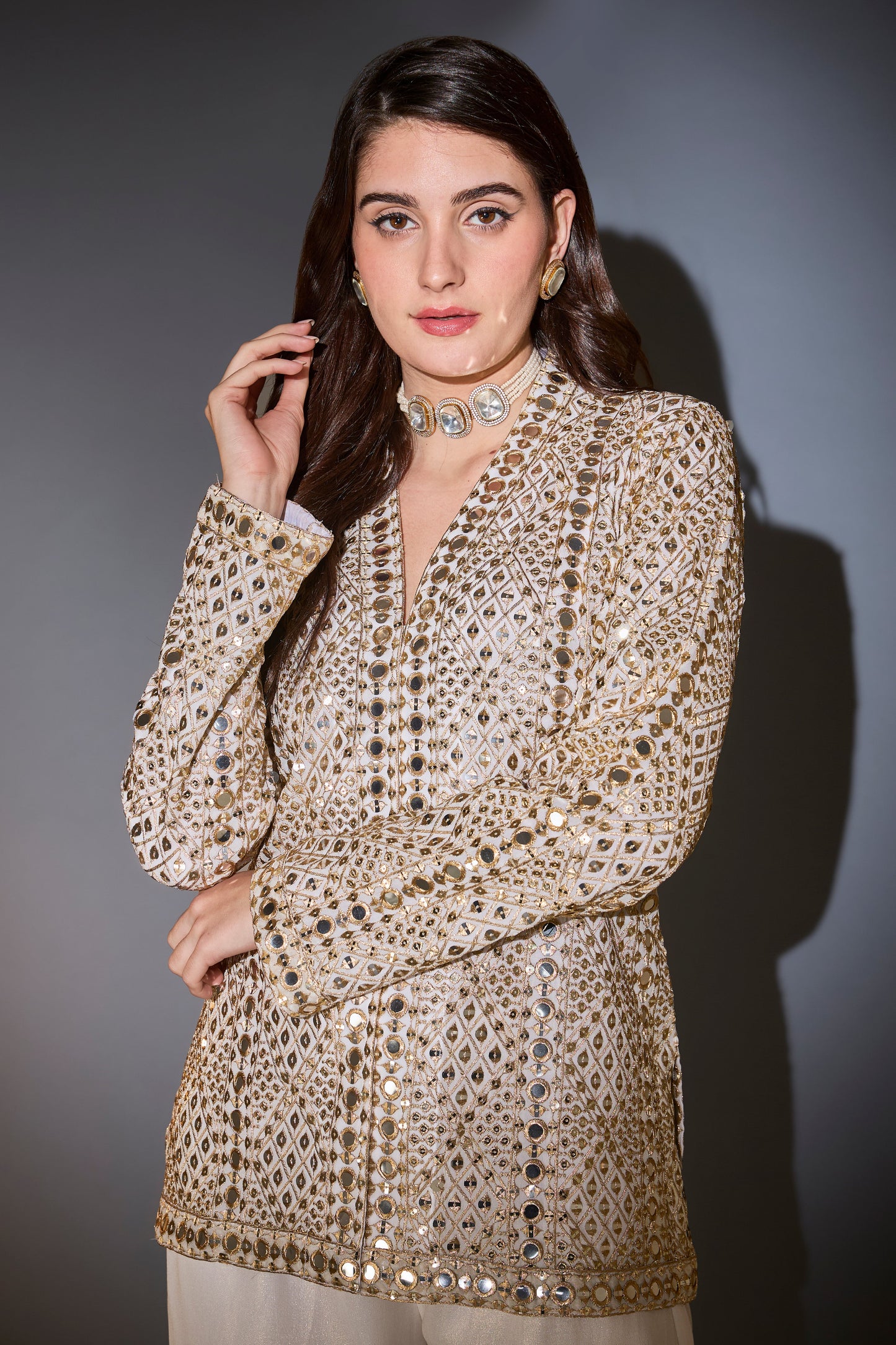 cream garara set with heavy mirror work and zari embroidery