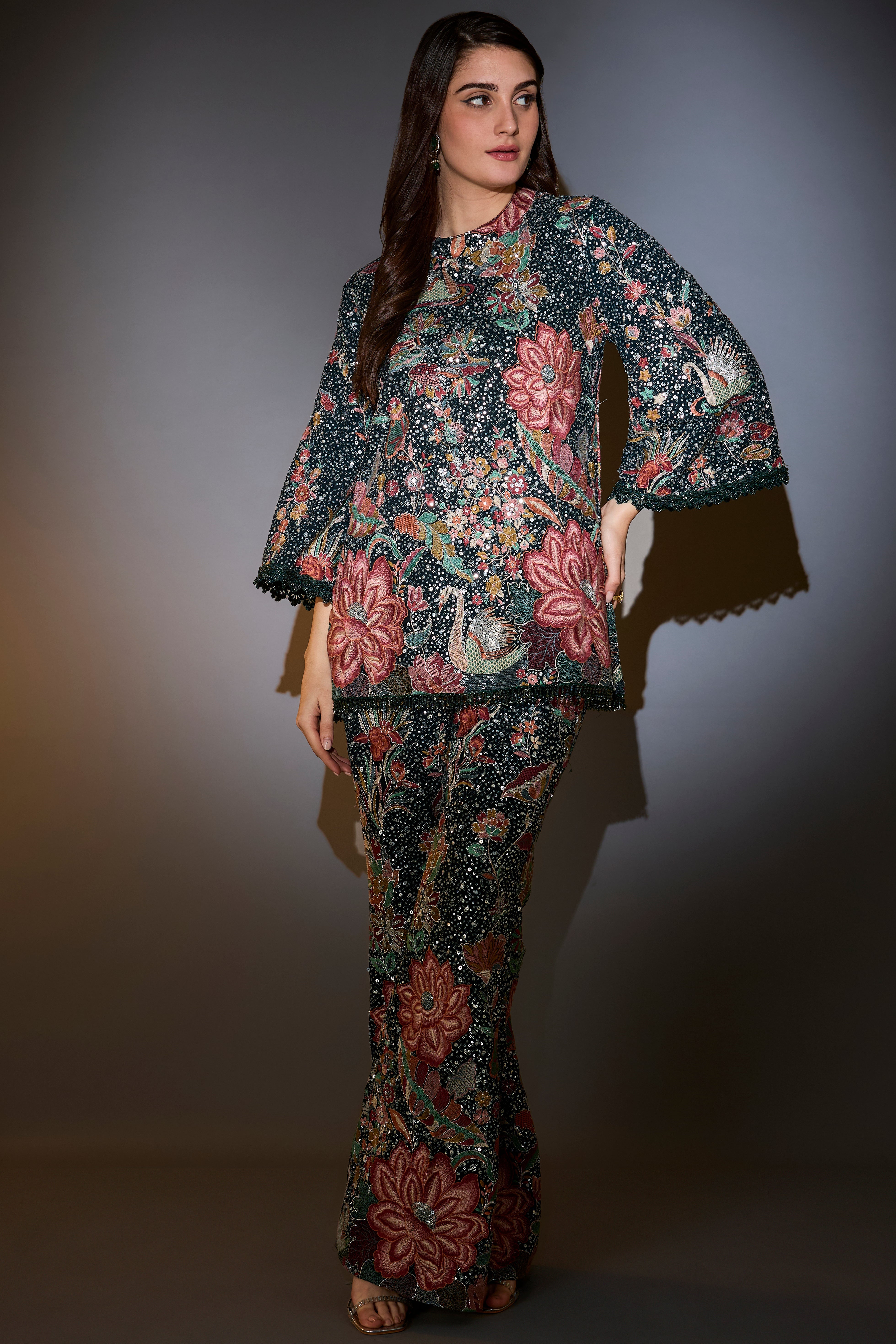 this co ord comes with heavy sequin and multi thread work with intricate flora and fauna embroidery