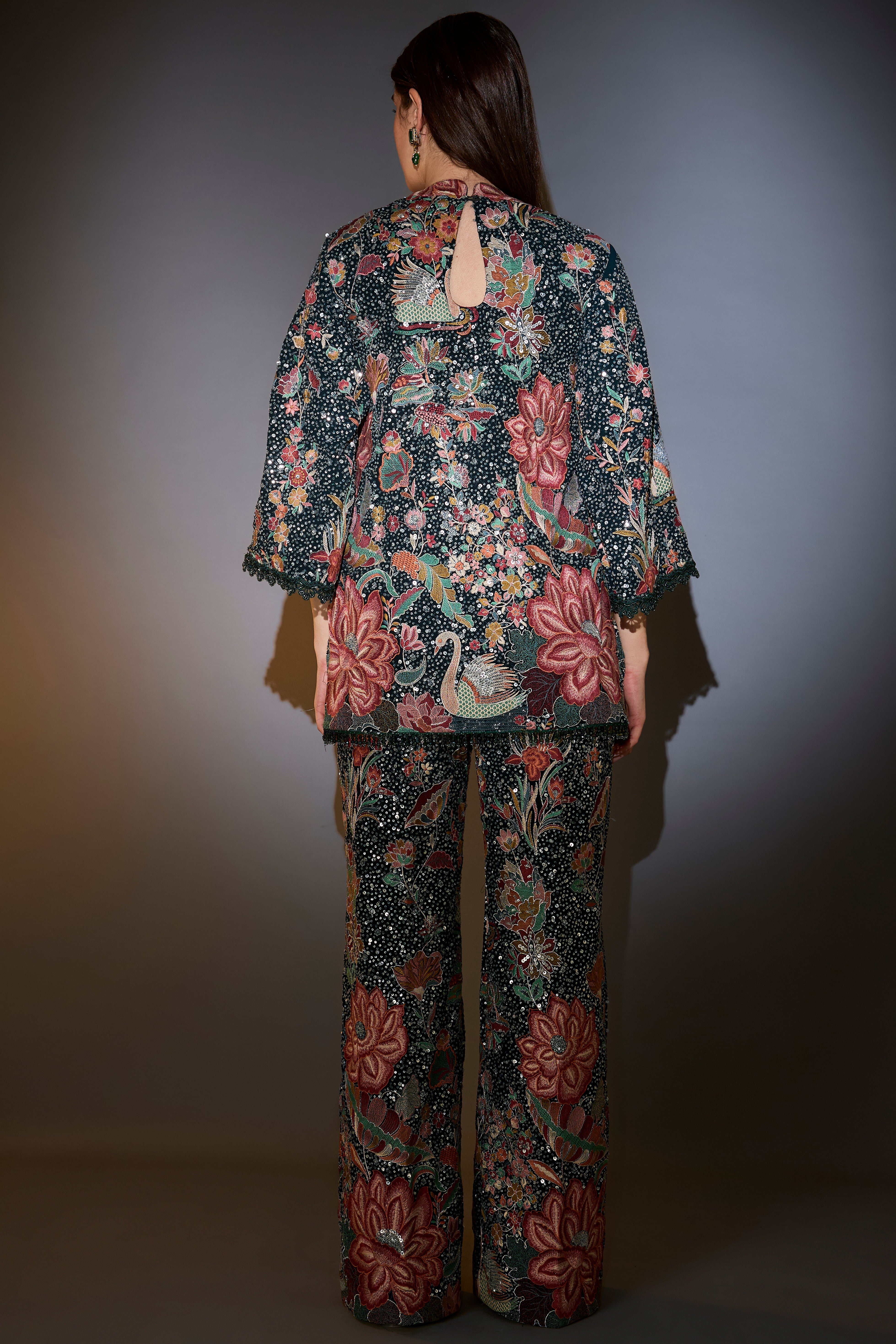 this co ord comes with heavy sequin and multi thread work with intricate flora and fauna embroidery