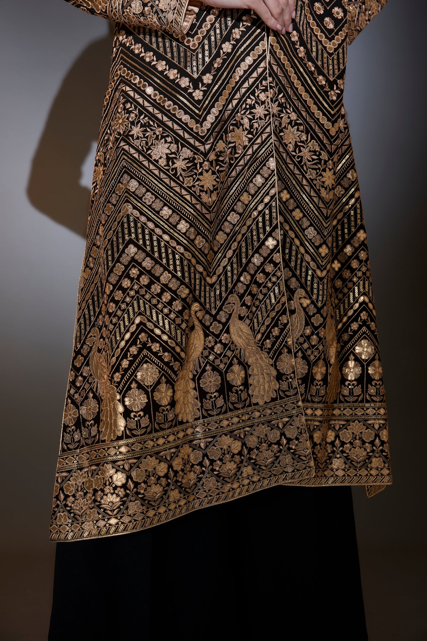 black jacket set with sharara adorned with heavy gold leather patch embroidery
