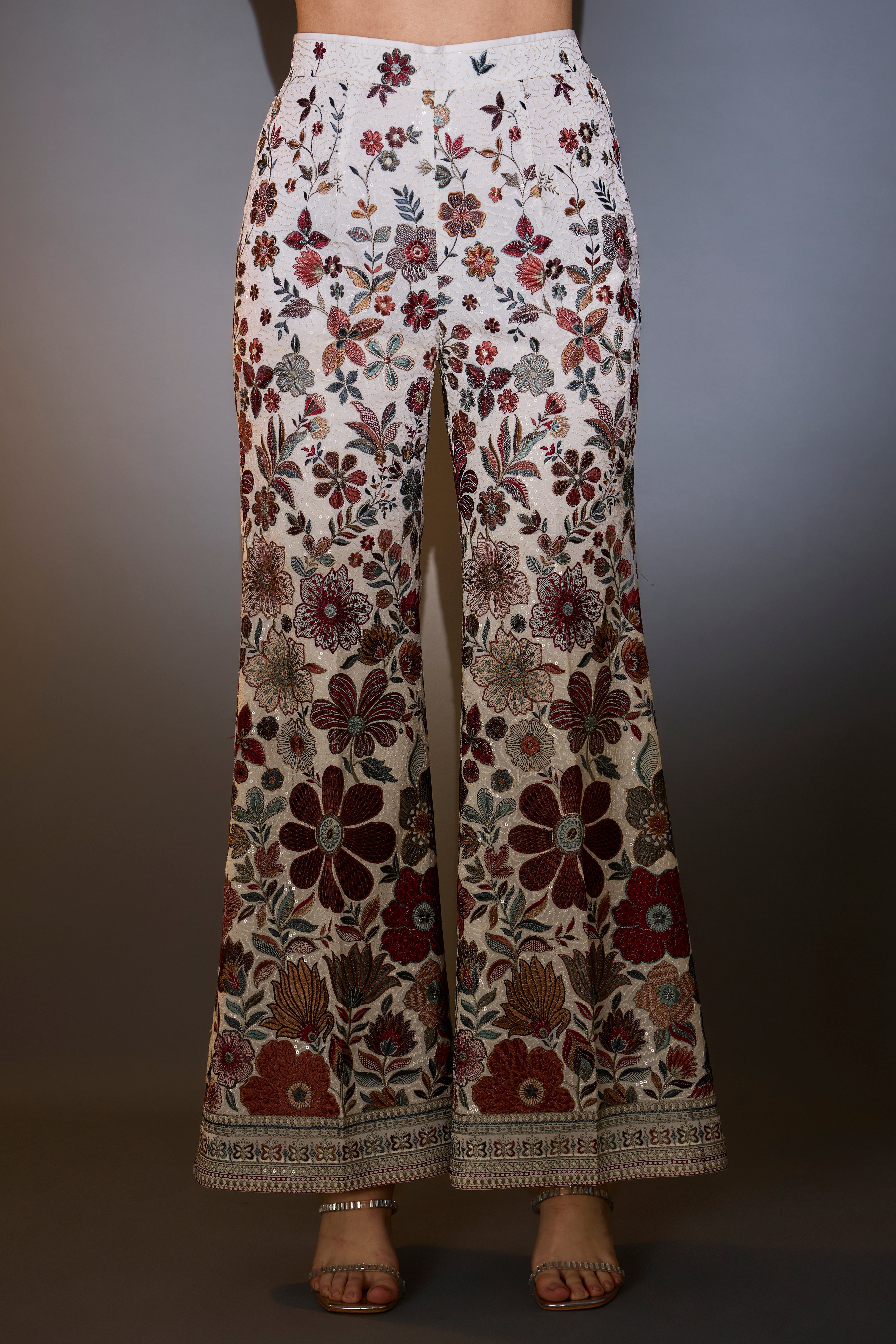 ivory co ord set with heavy multi thread floral embroidery and sprinkle and sequin work