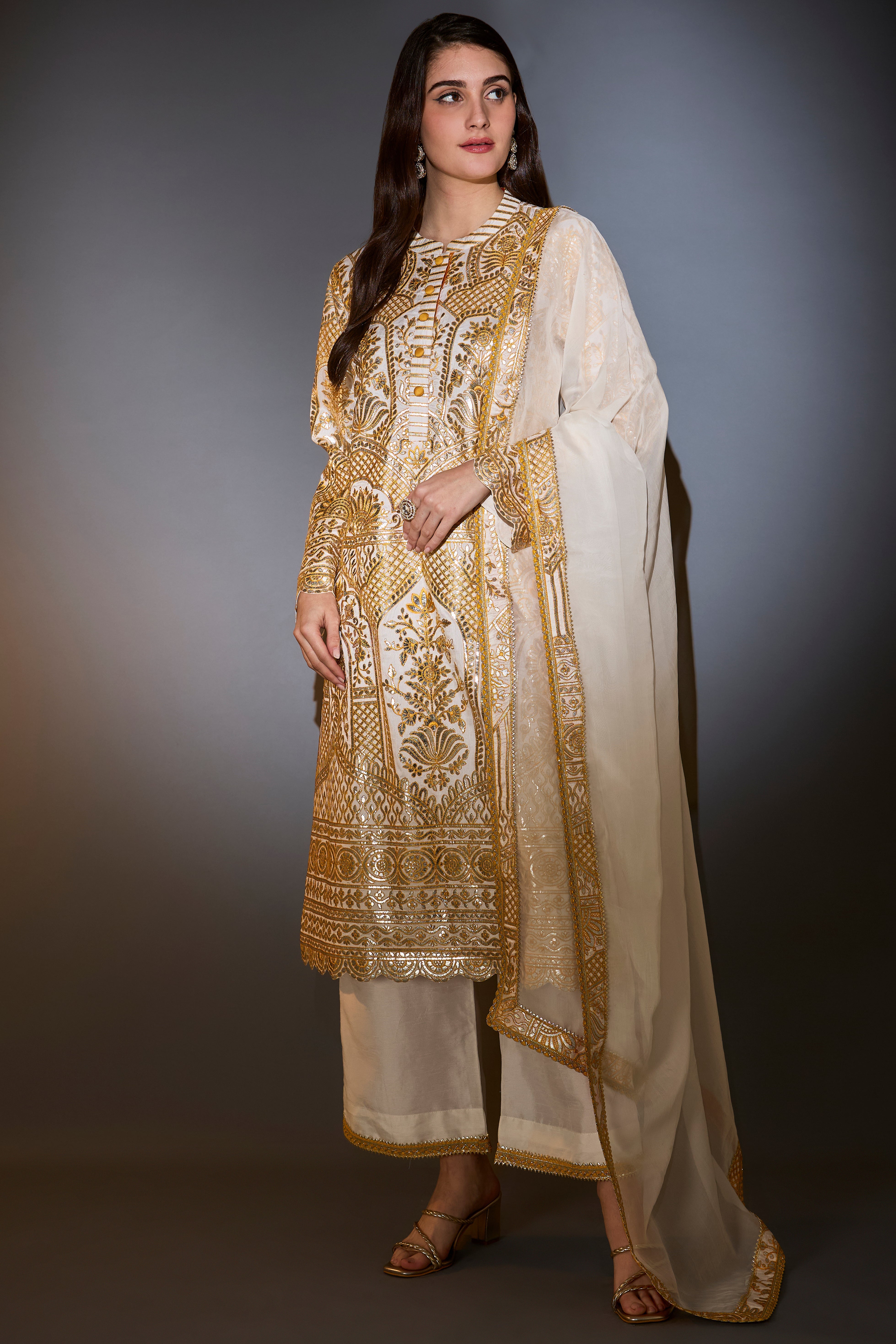 yellow and ivory suit set with heavy gota embroidery paired with dupatta with border