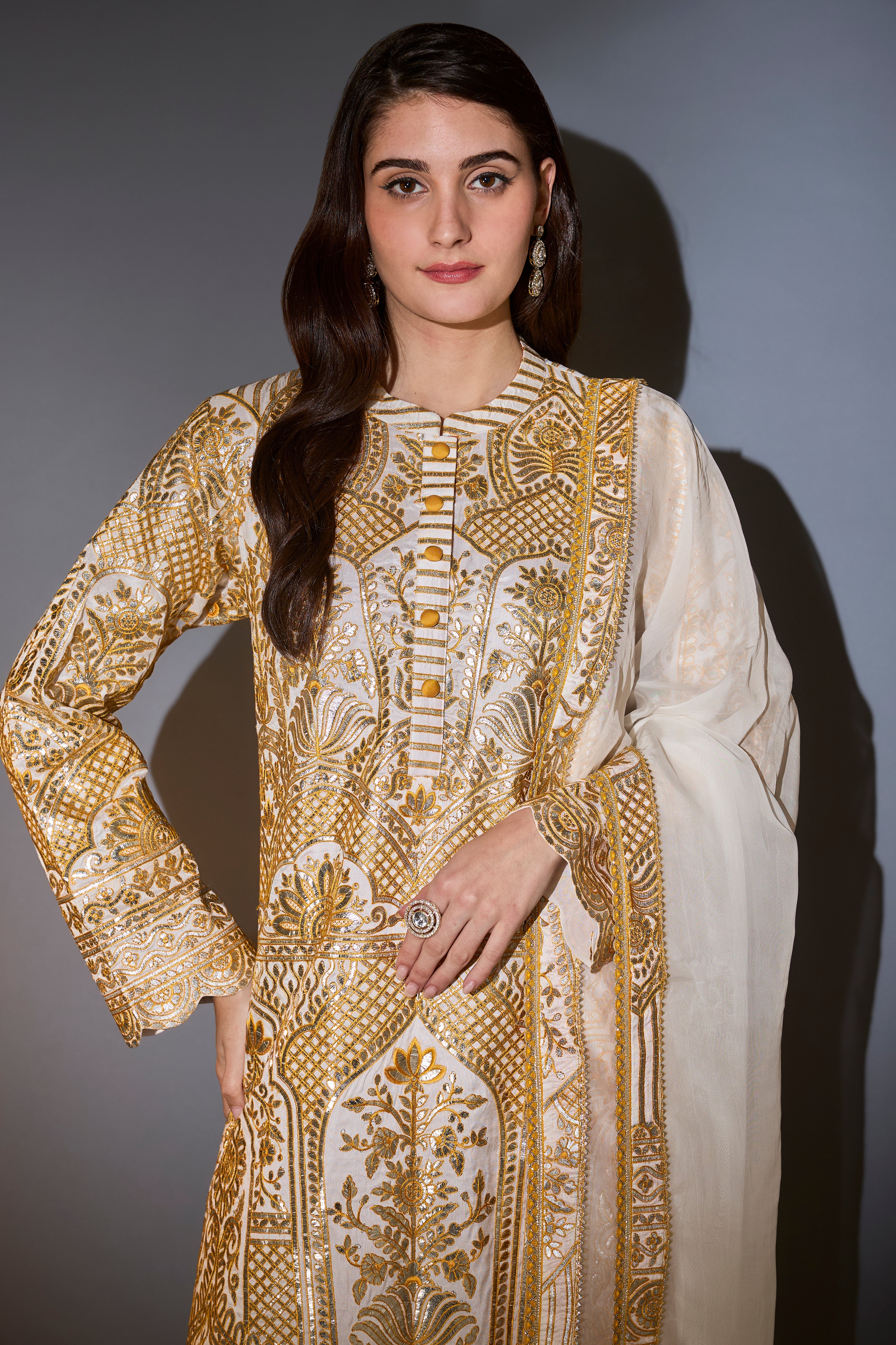 yellow and ivory suit set with heavy gota embroidery paired with dupatta with border