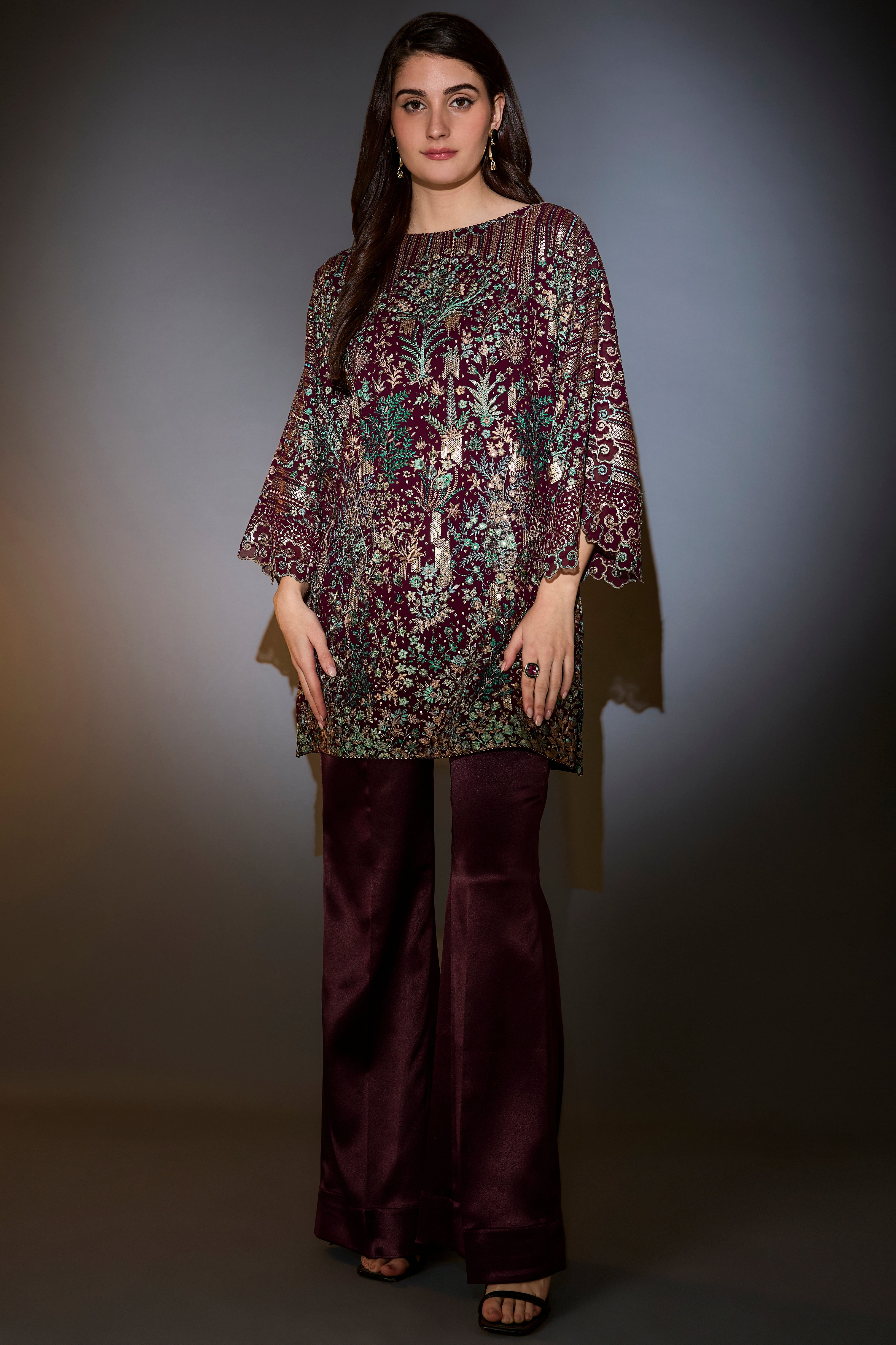 wine co ord set with heavy multi thread embroidery and flora and fauna motifs