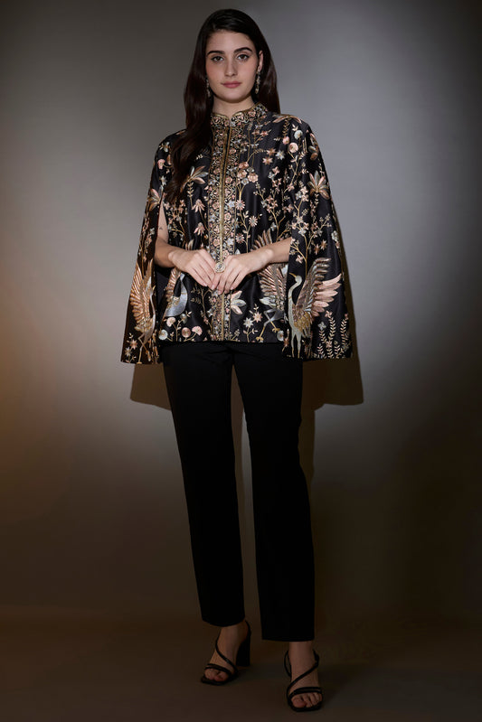 black cape with intricate multi thread work elevated by swan motifs