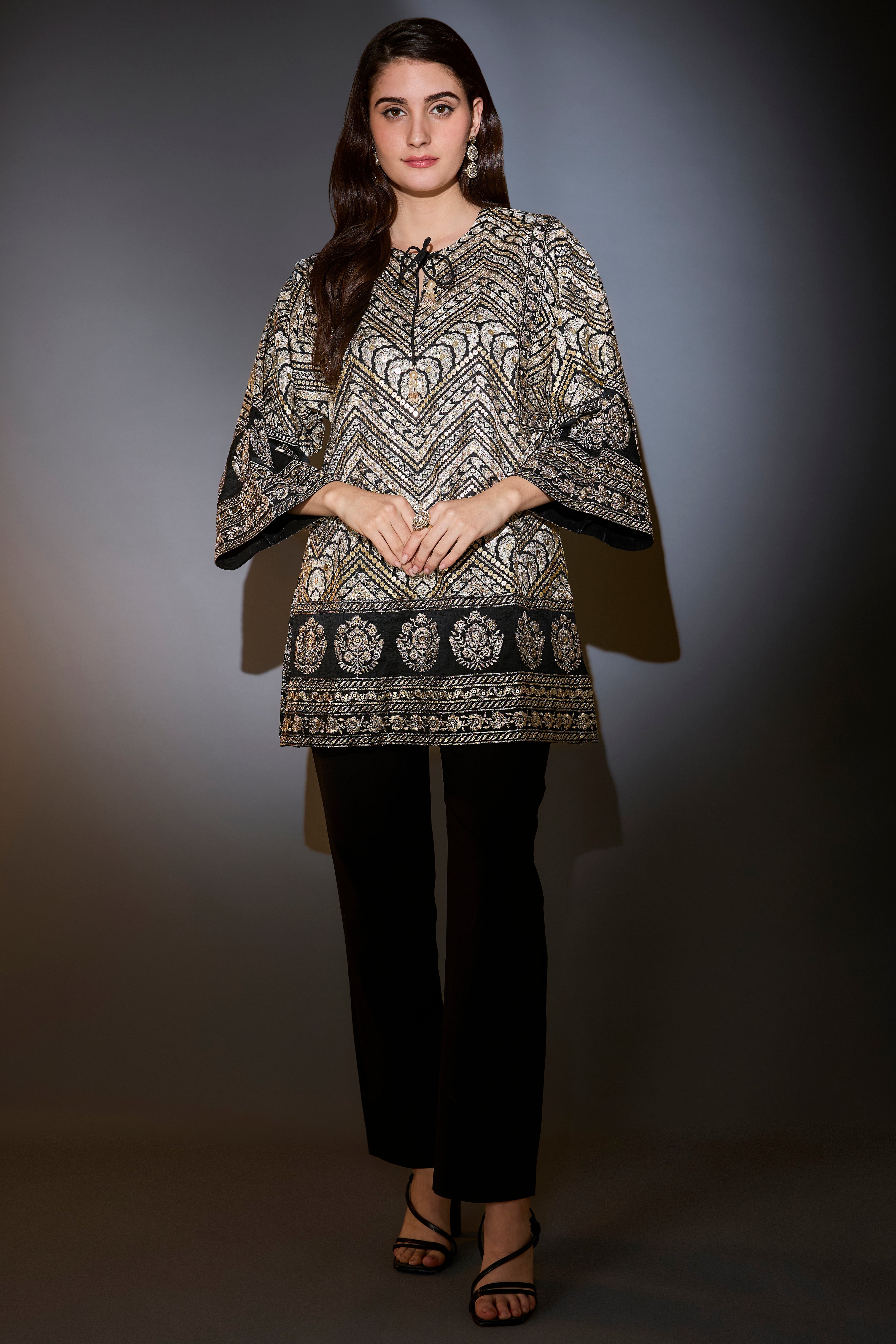 black tunic with heavy zari and gota work sprinkled with sequins