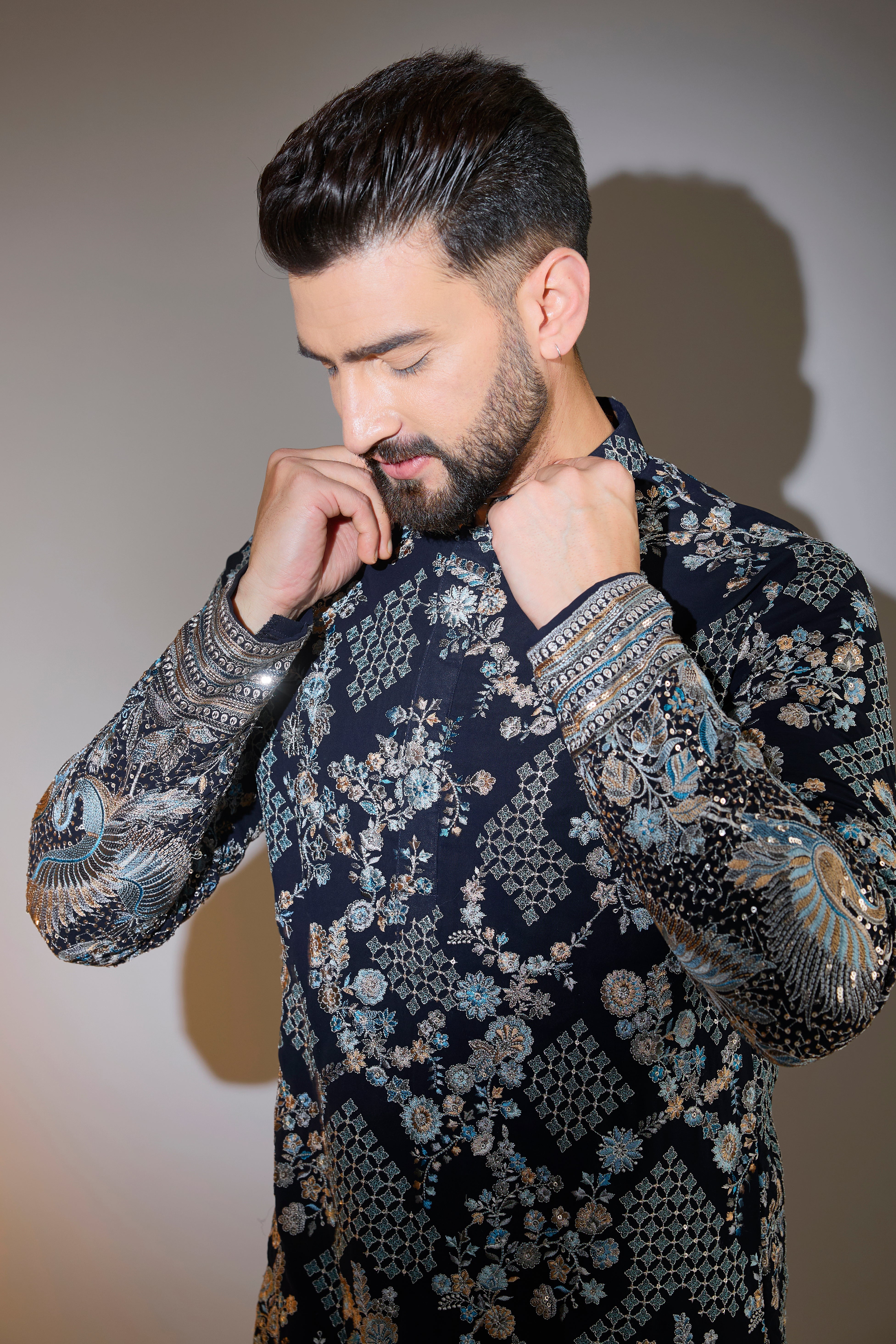 blue chikankari kurta with intriacte flora and fauna embroidery