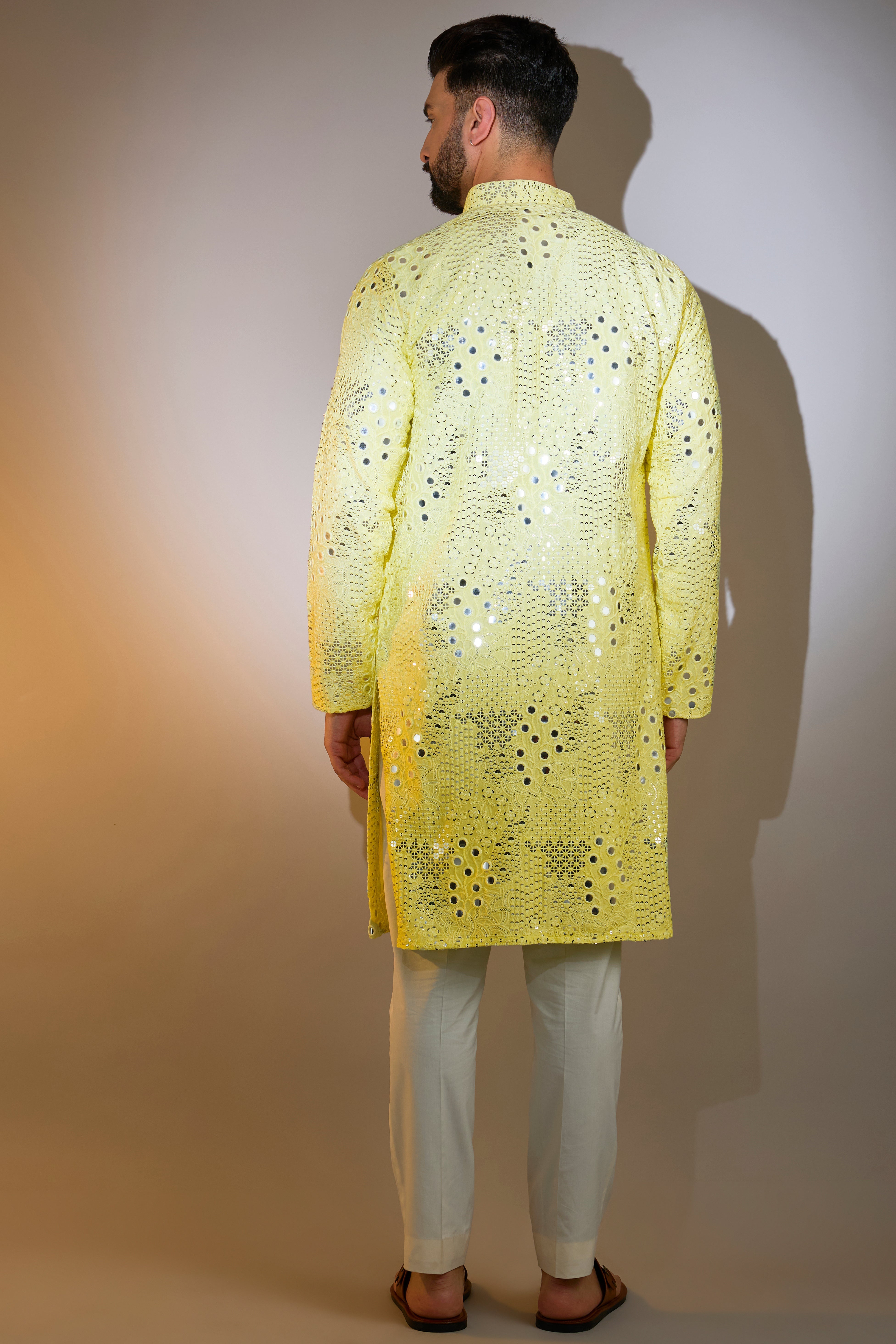 yellow mirror work kurta with intricate sequin work