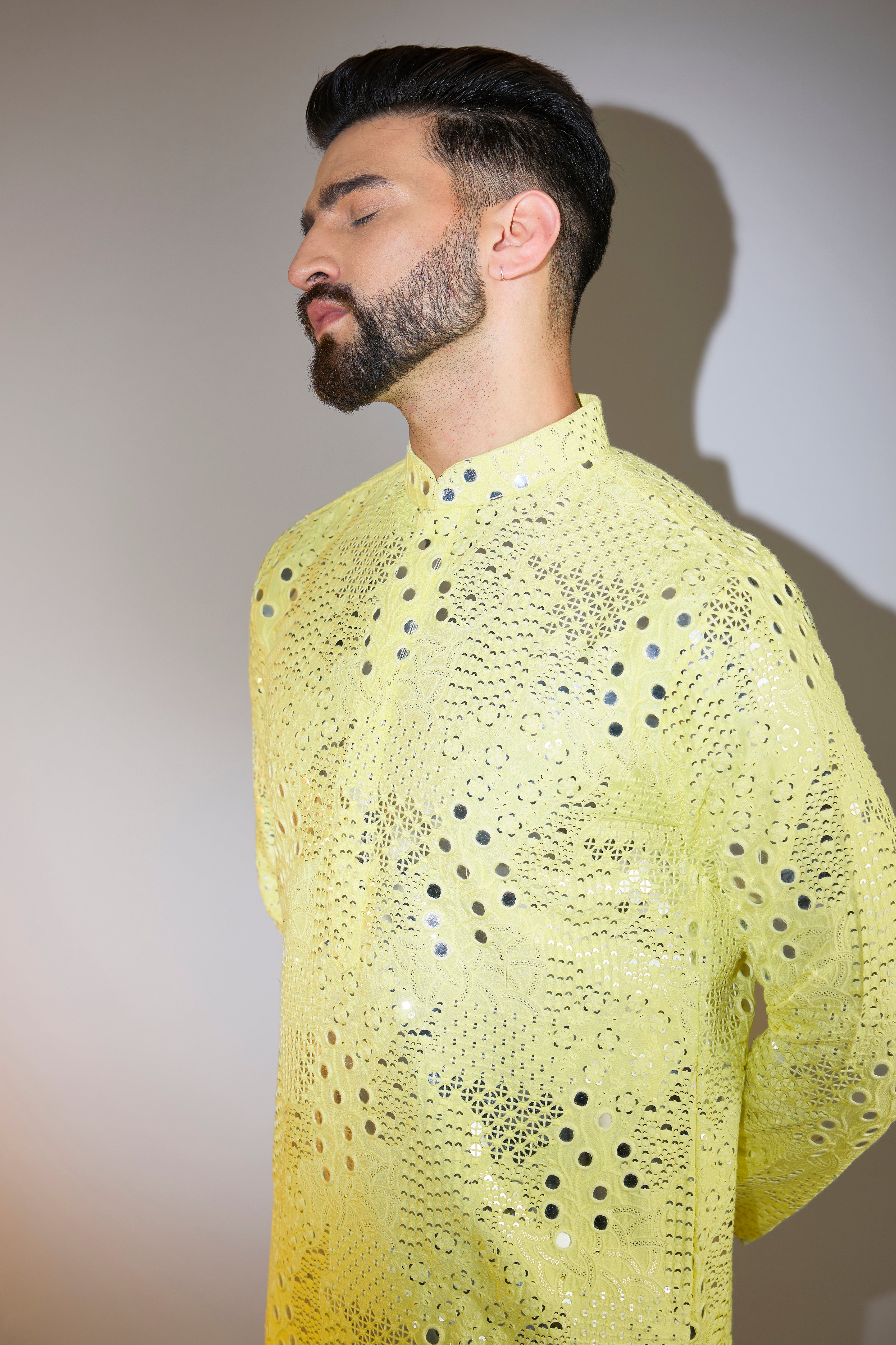 yellow mirror work kurta with intricate sequin work