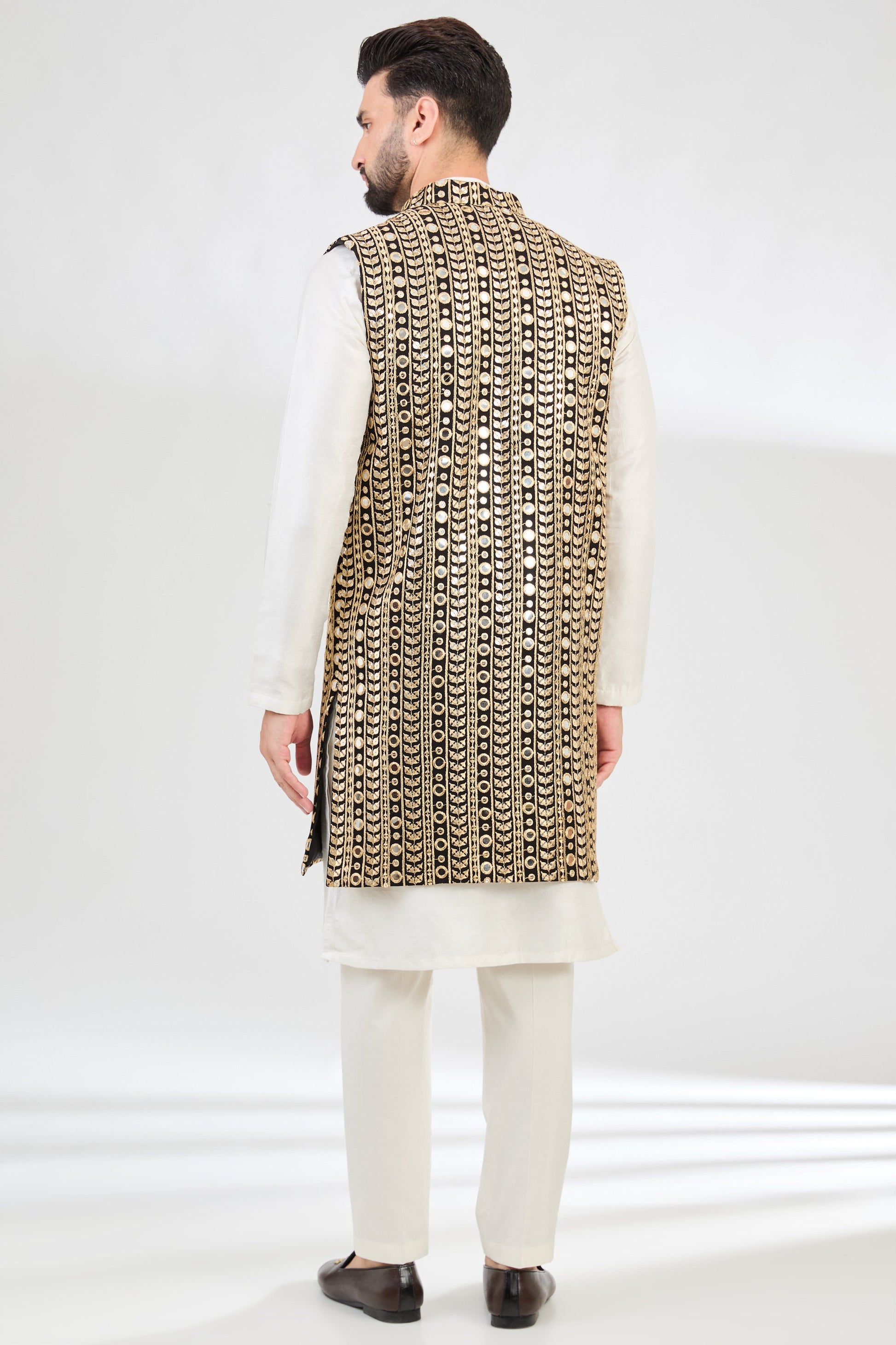Black mirror-work long open shrug with zari-detailing. - kasbahmen
