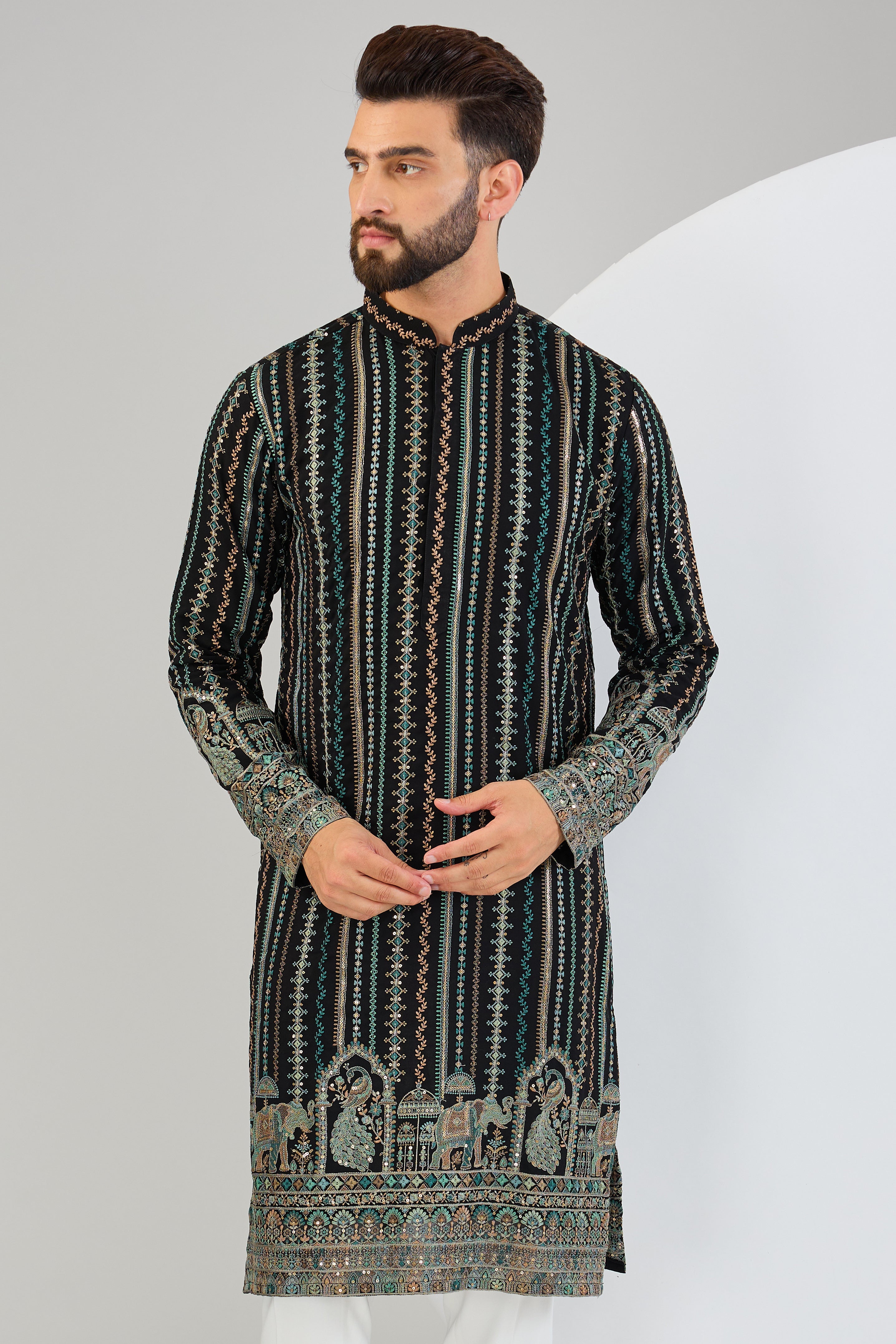 Black chikankari kurta with intricate multi-thread work and detailed kalamkari work on the ghera. - kasbahmen