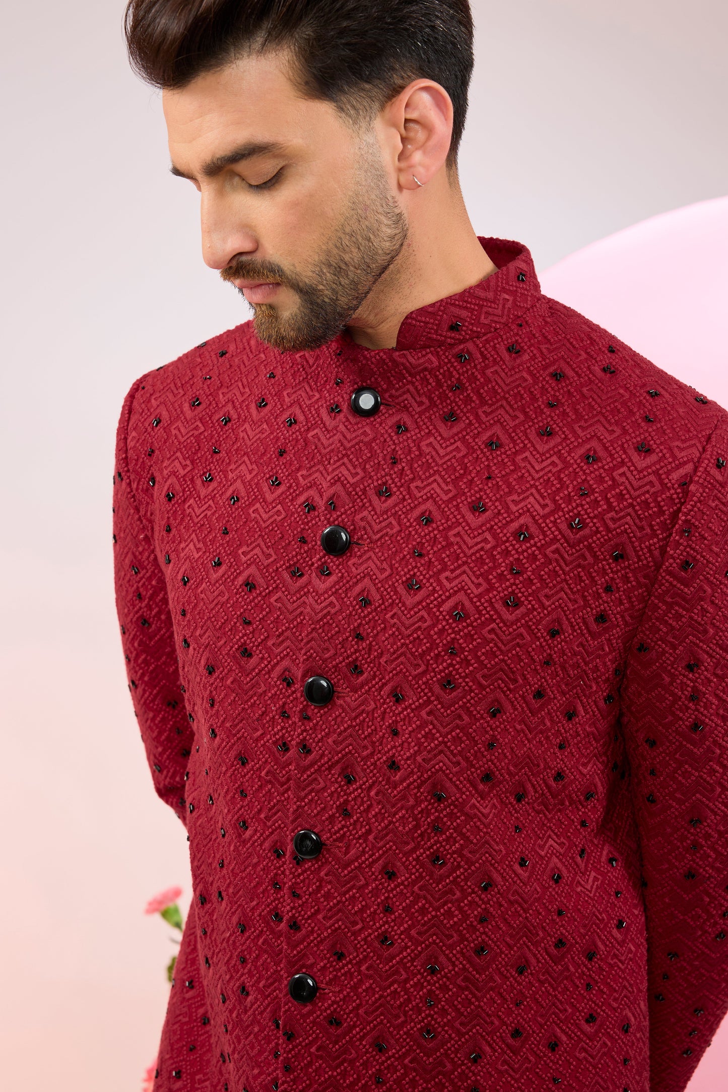 red geometrically embridred sherwani with black cutdana